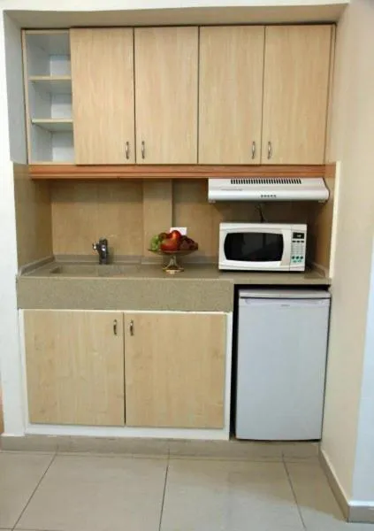Kitchen or kitchenette in Elysee Residence