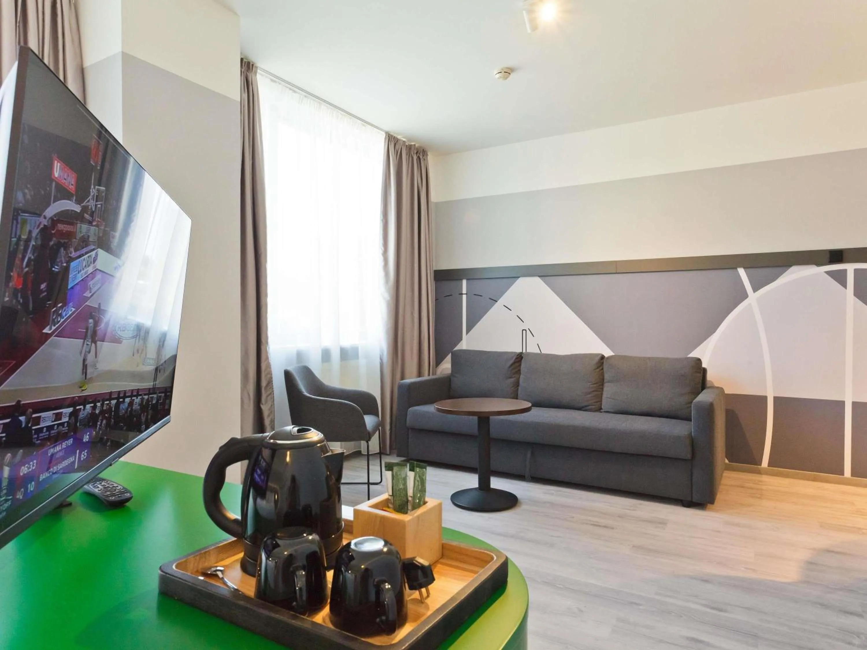 Bedroom in IBIS Styles Kaunas Centre