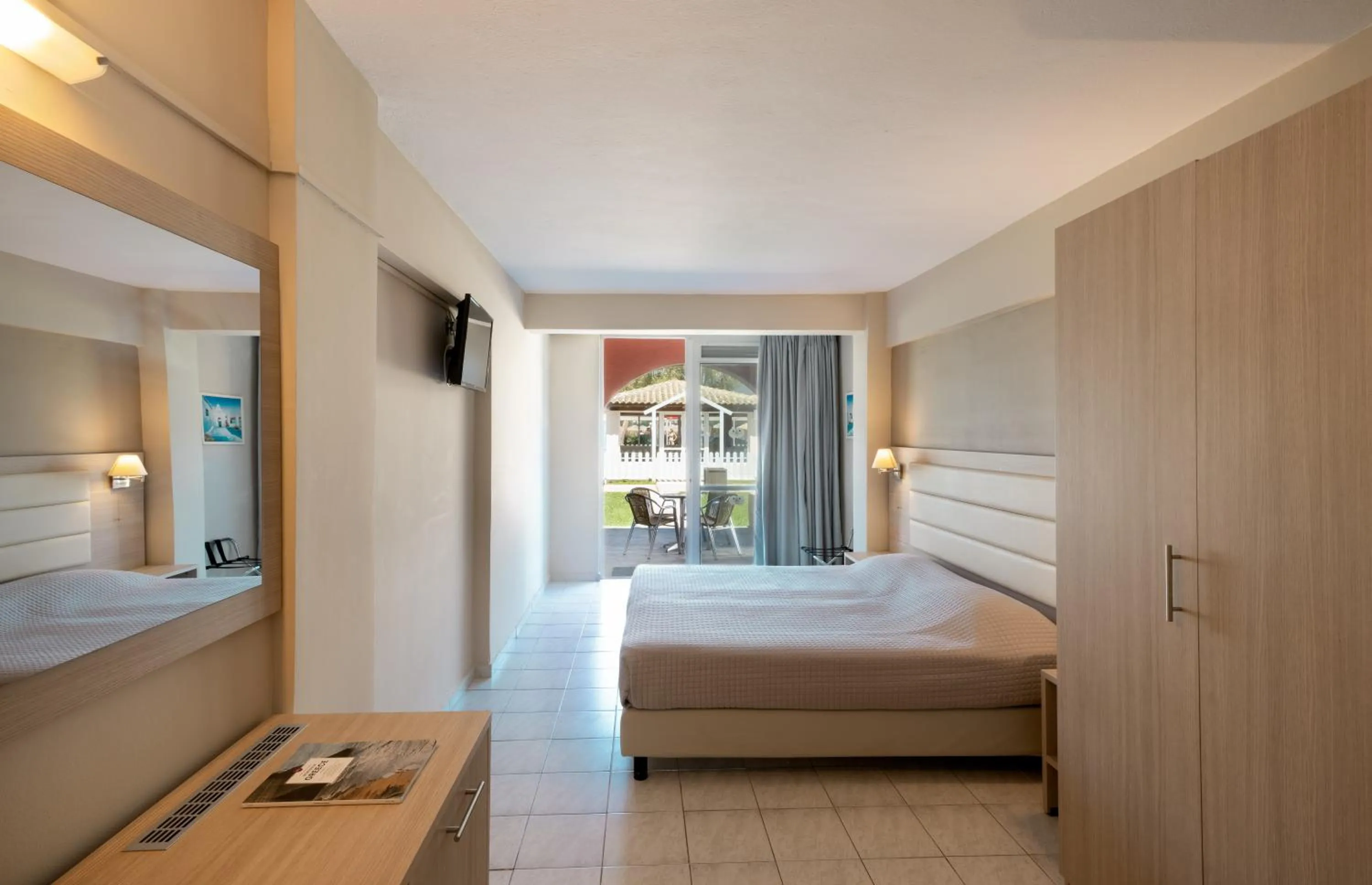 Photo of the whole room, Bed in Canvas by Mitsis Messonghi