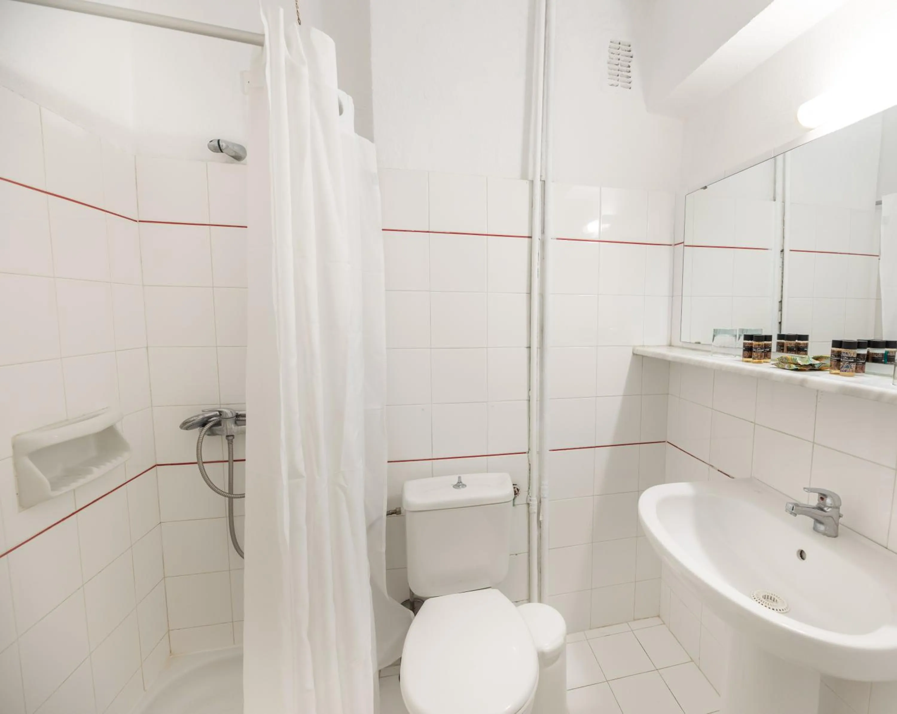 Bathroom in Canvas by Mitsis Messonghi