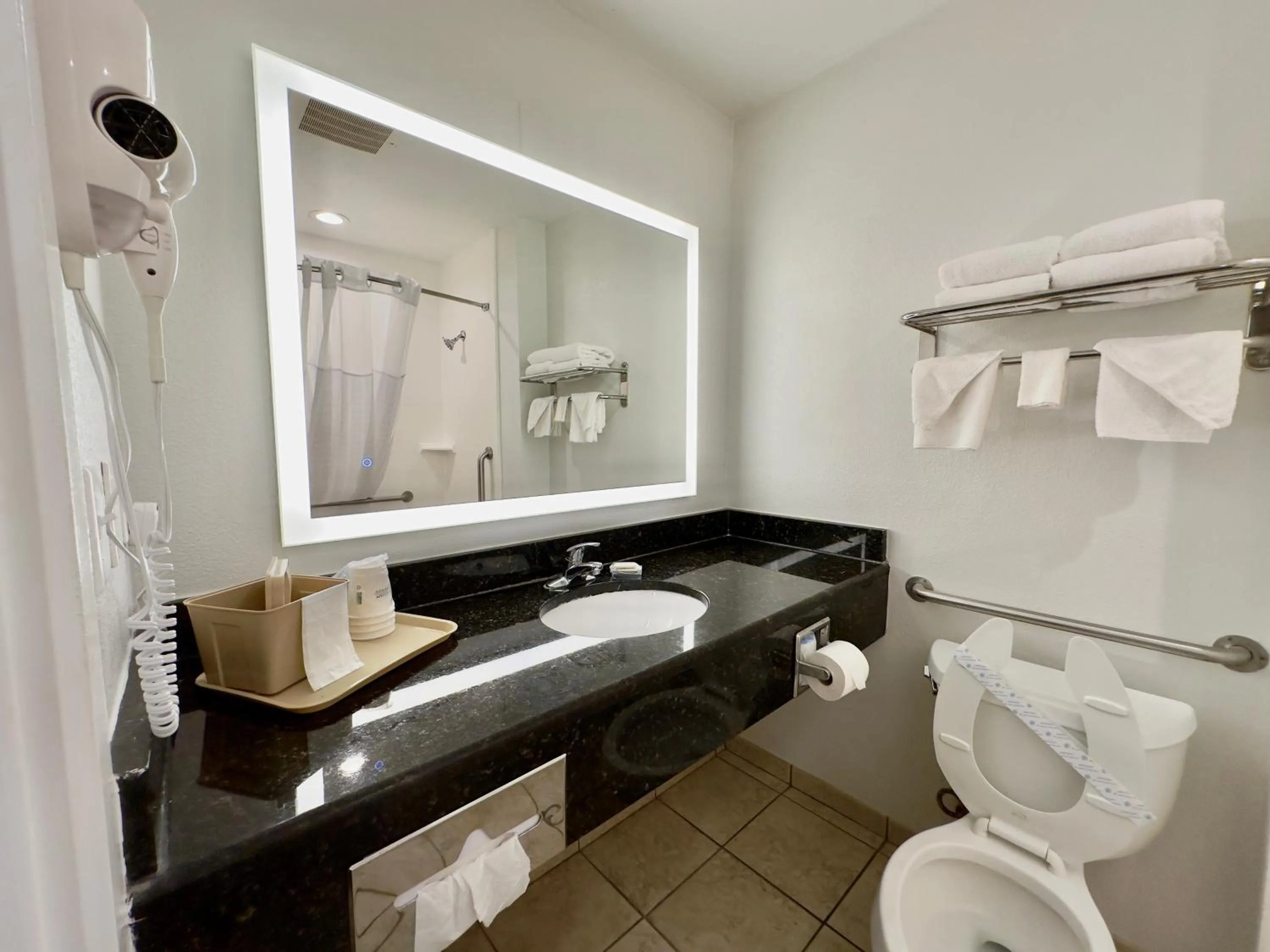 Bathroom in Days Inn & Suites by Wyndham Lakeland