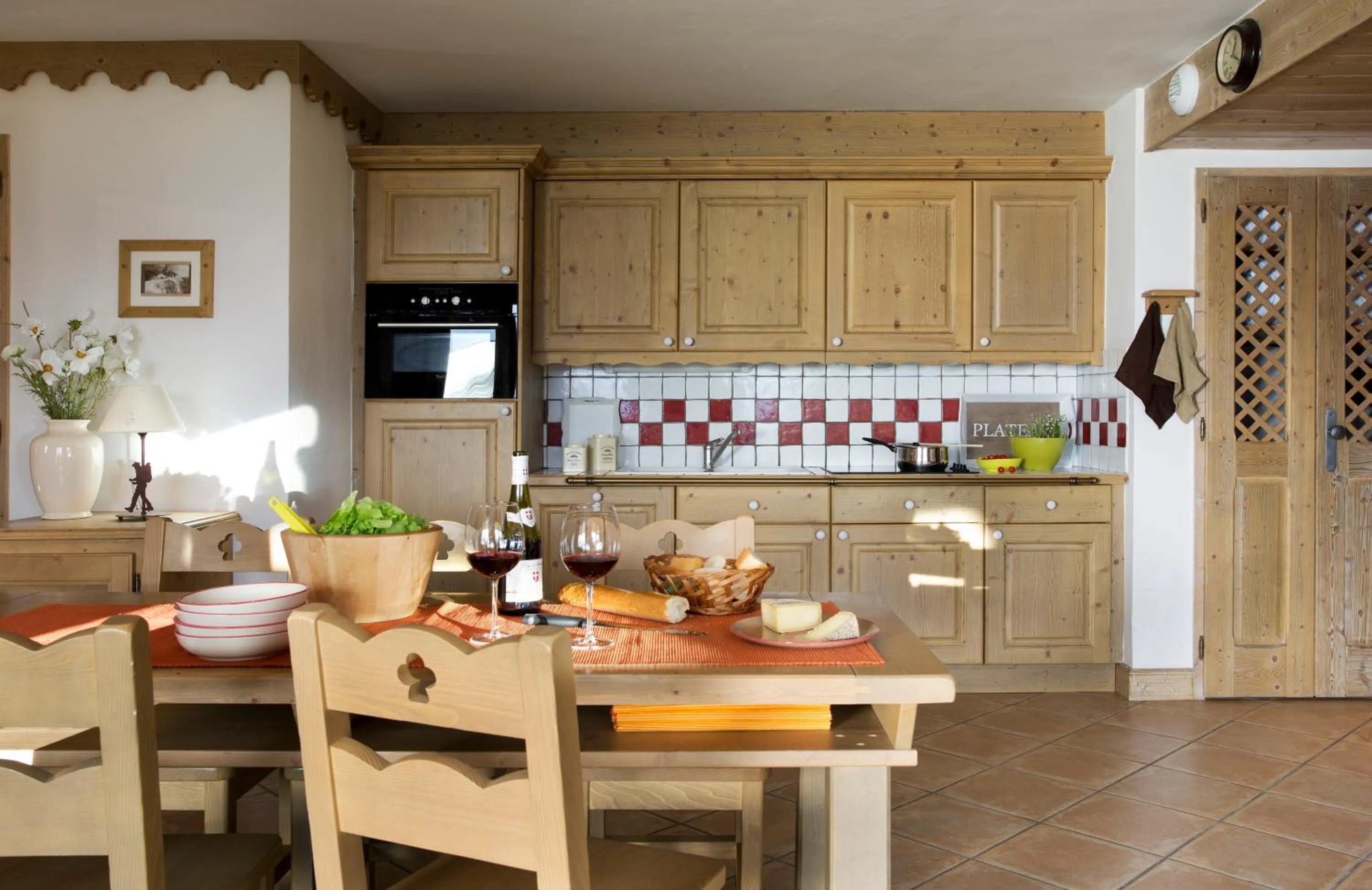 Kitchen or kitchenette in CGH Résidences & Spas La Ferme Du Val Claret