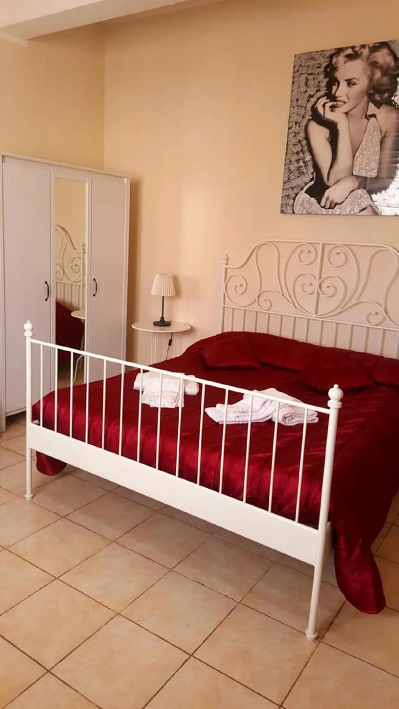 Bed in I Cappuccini Rooms