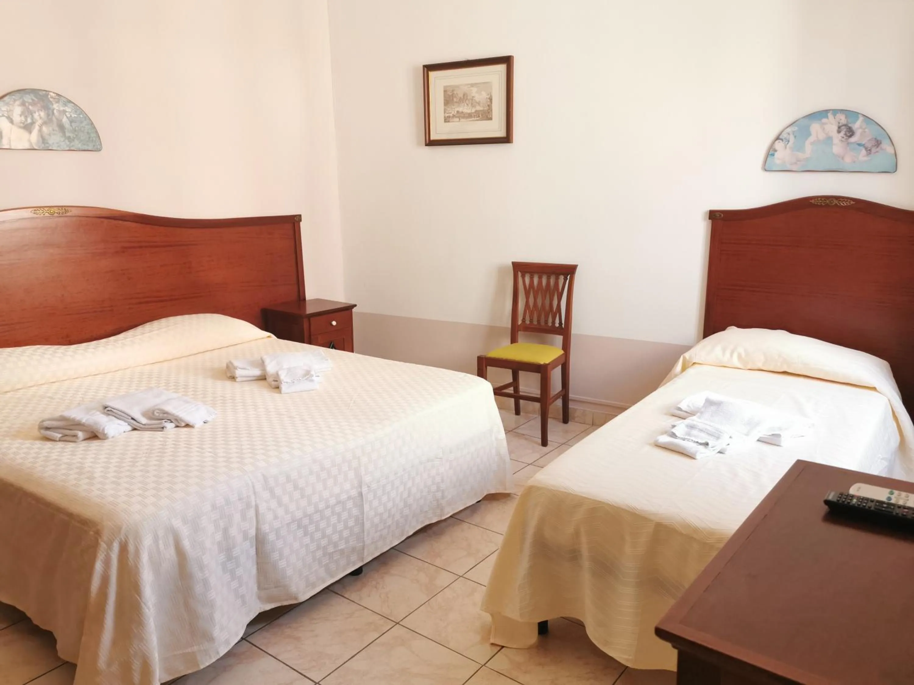 Bedroom in I Cappuccini Rooms