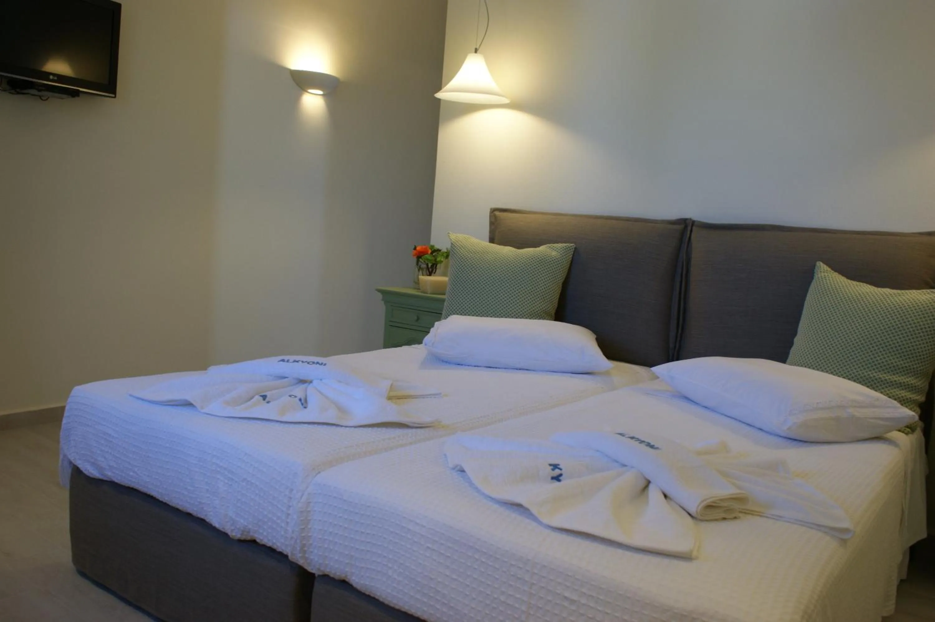 Bed in Alkyoni Beach Hotel