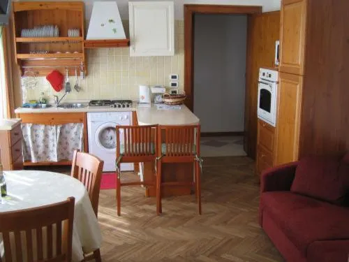Kitchen or kitchenette in Villa Gabriella B&B - Apartments