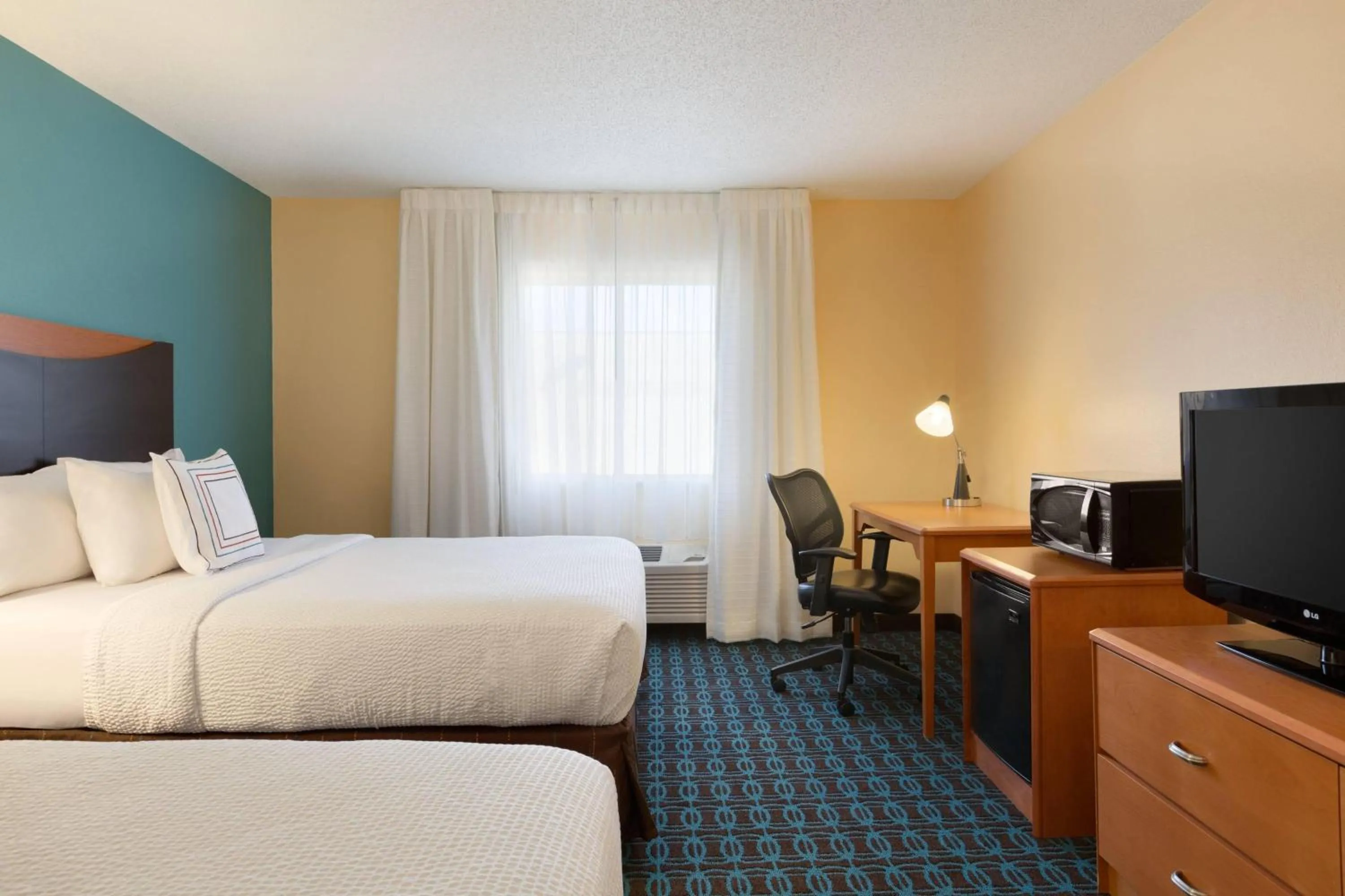 Photo of the whole room, Bed in Fairfield Inn & Suites Bismarck North