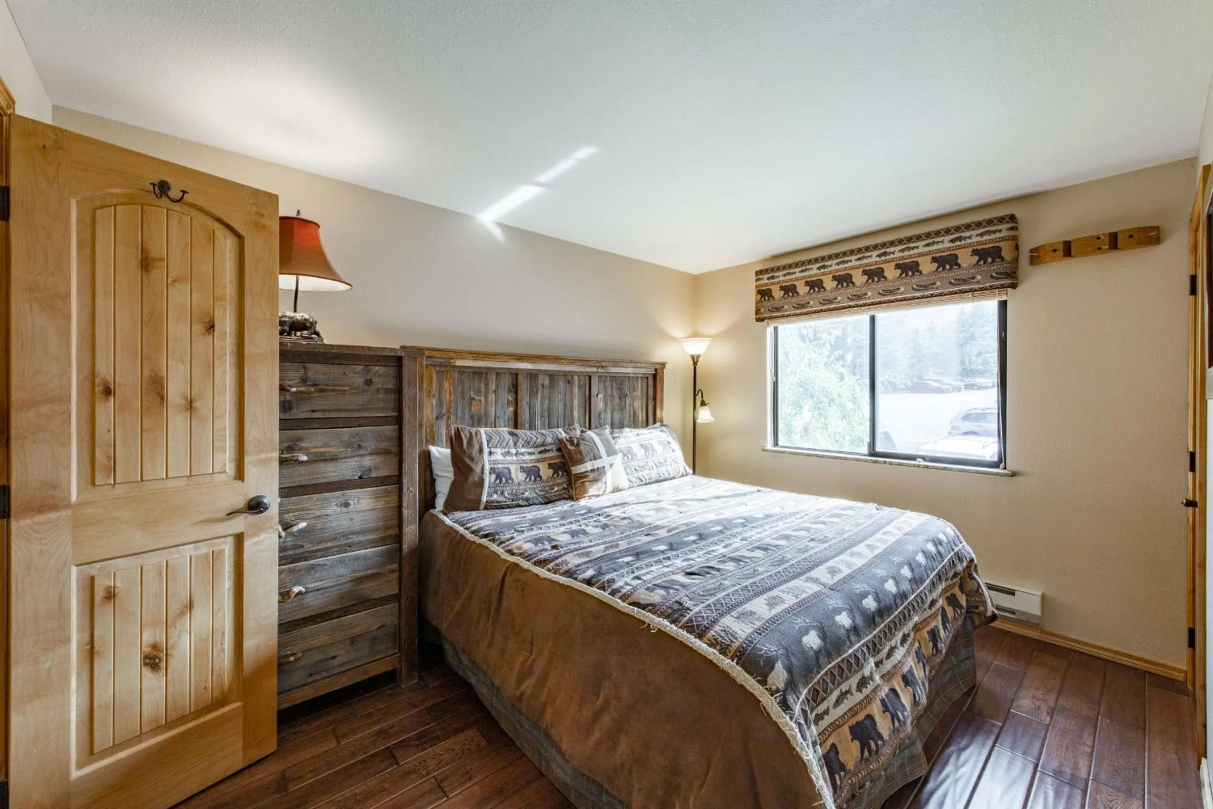 Bed in Red Pine Condominiums by All Seasons Resort Lodging