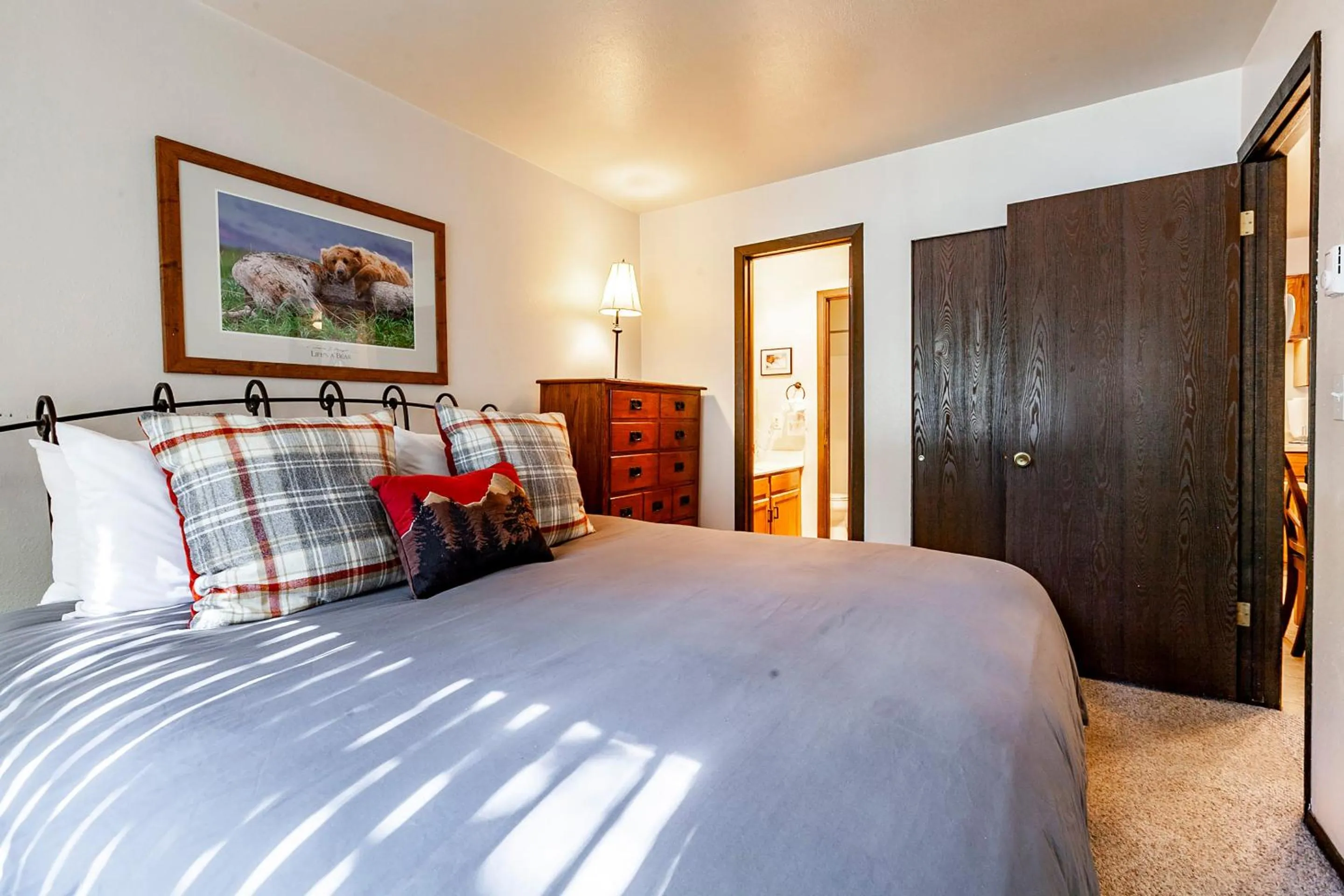 Bed in Red Pine Condominiums by All Seasons Resort Lodging