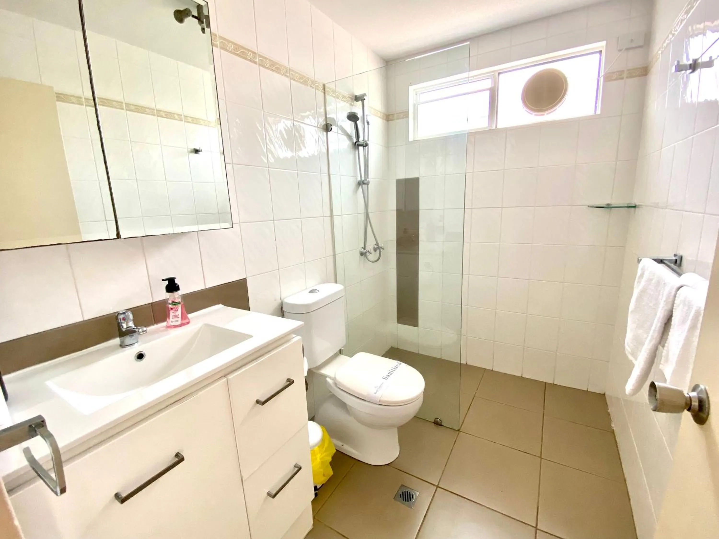 Shower in Reef Gateway Apartments