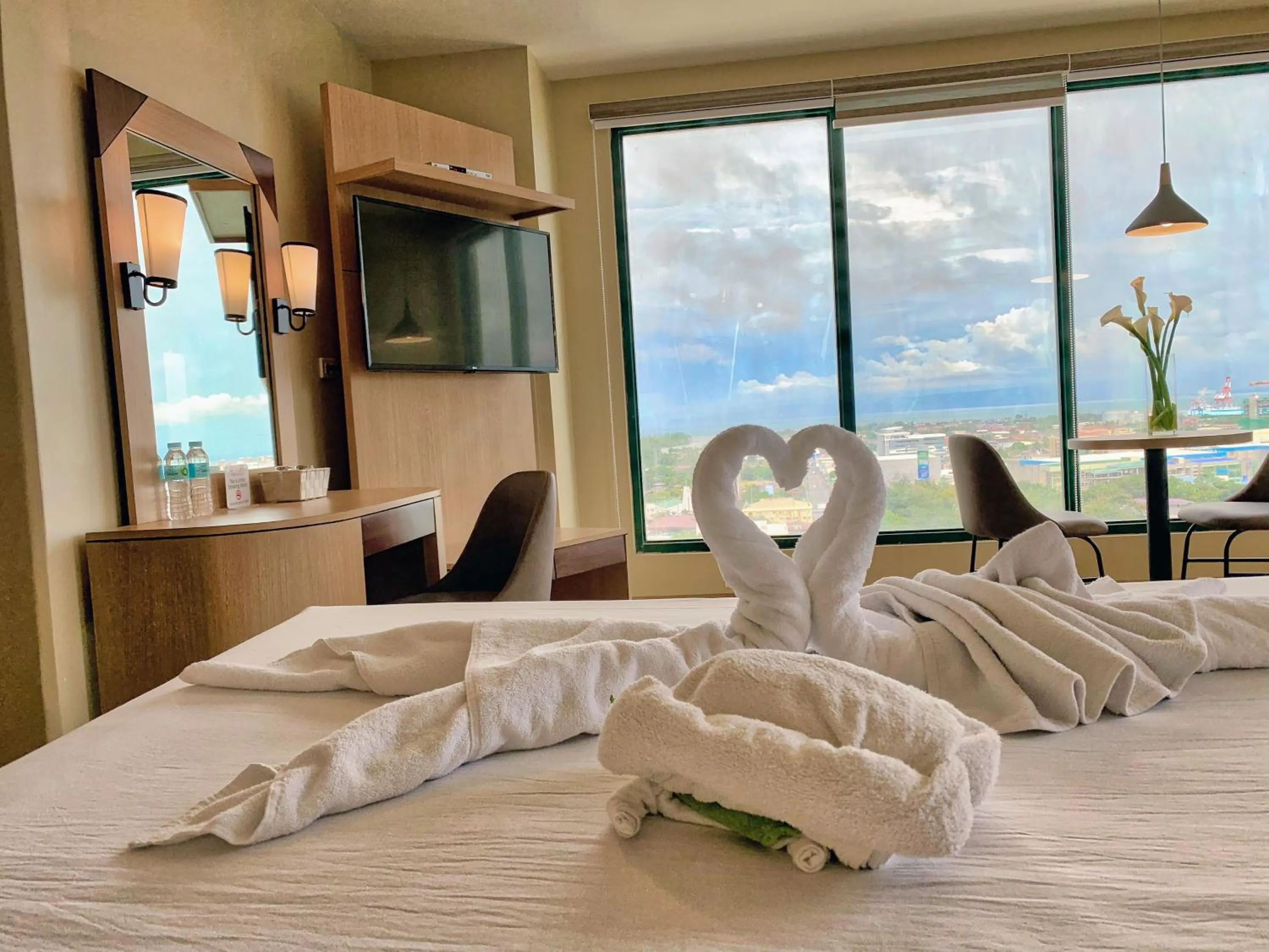 Bed in New Dawn Hotel Plus