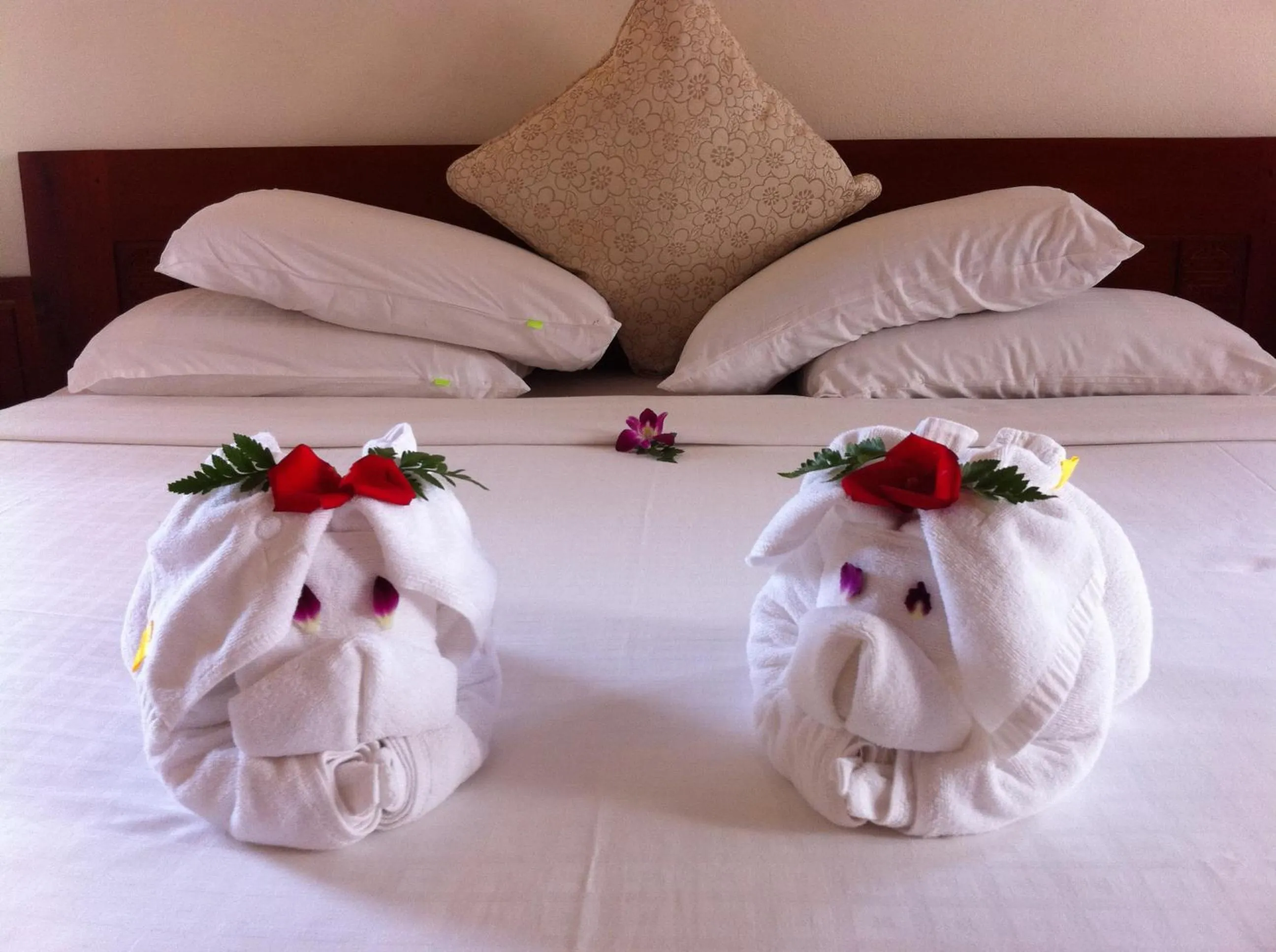 Bed in Long Life Riverside Hotel