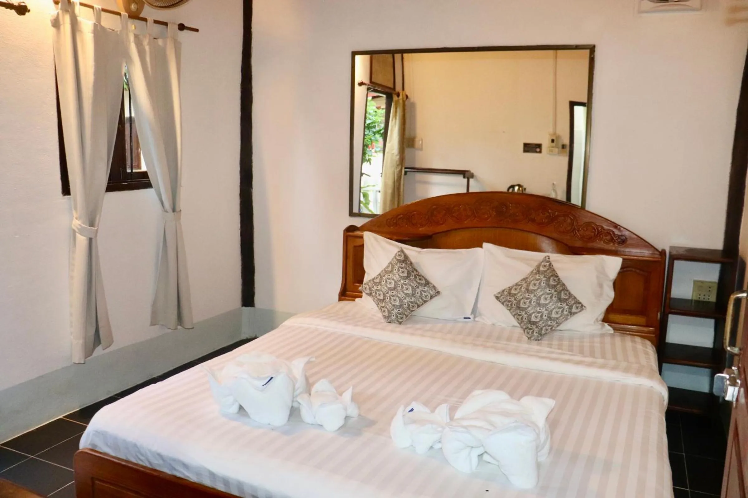 Bed in Villa Khoum Xieng Thong Boutique