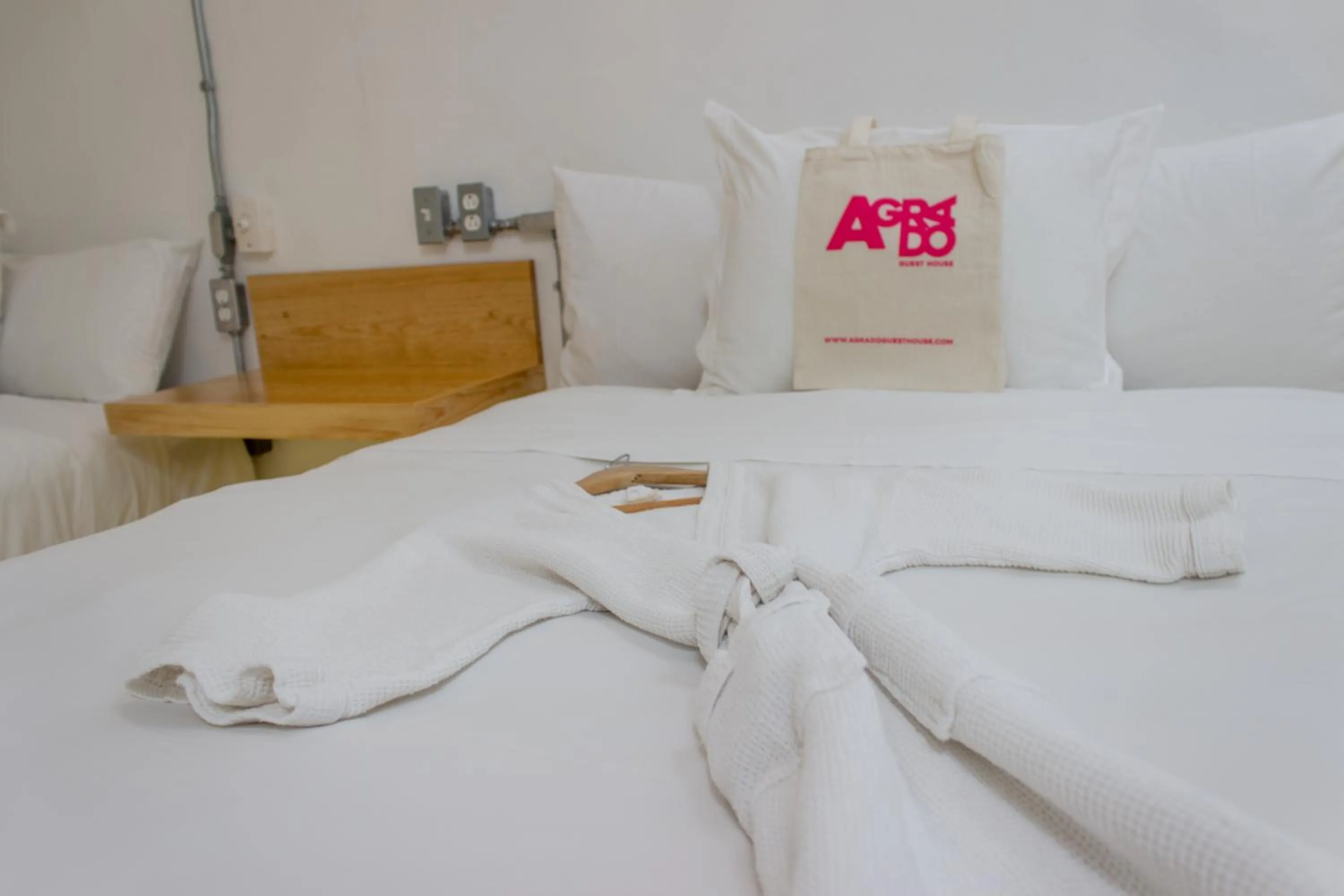 Bed in Agrado Guest House