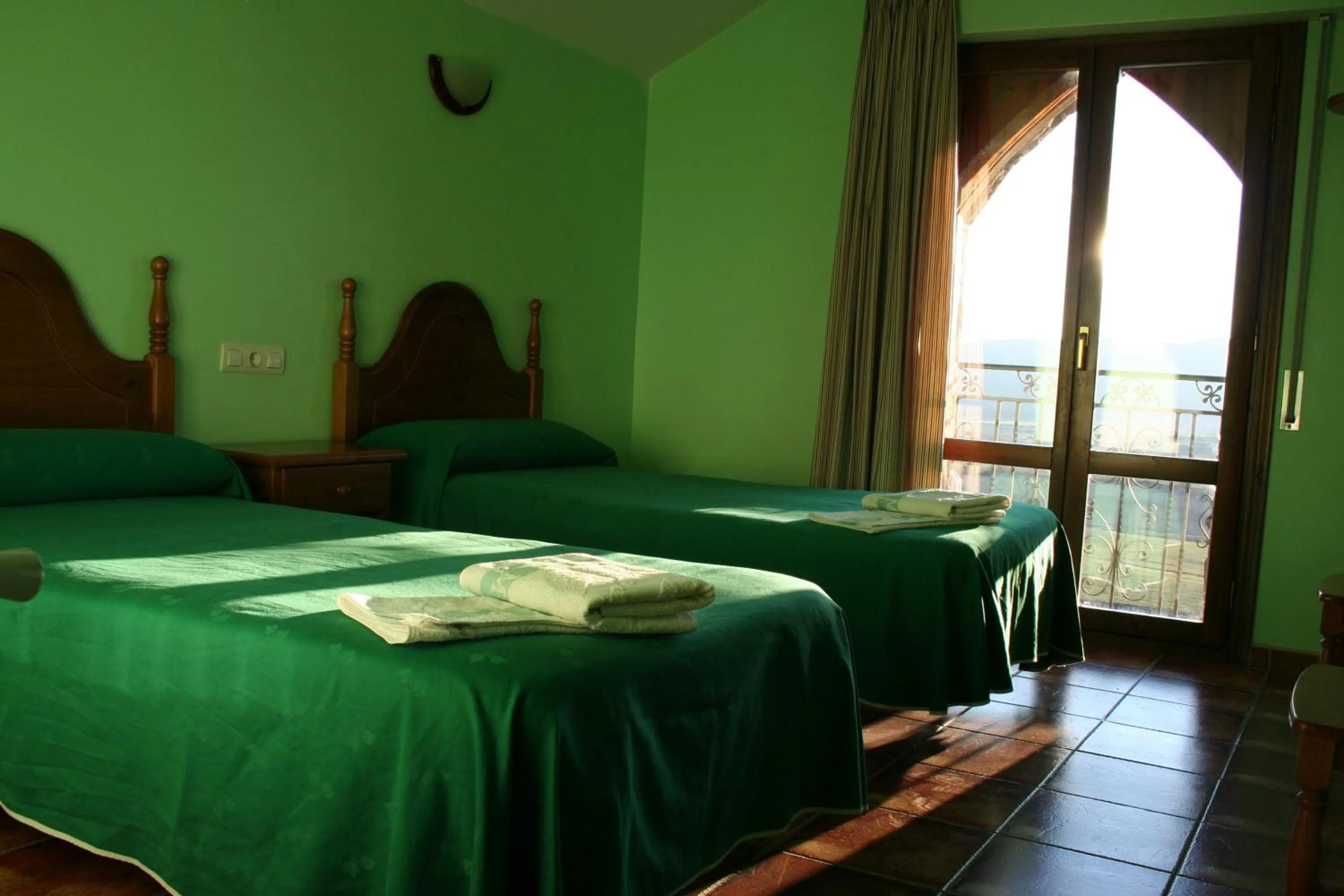 Photo of the whole room, Bed in El Churrón