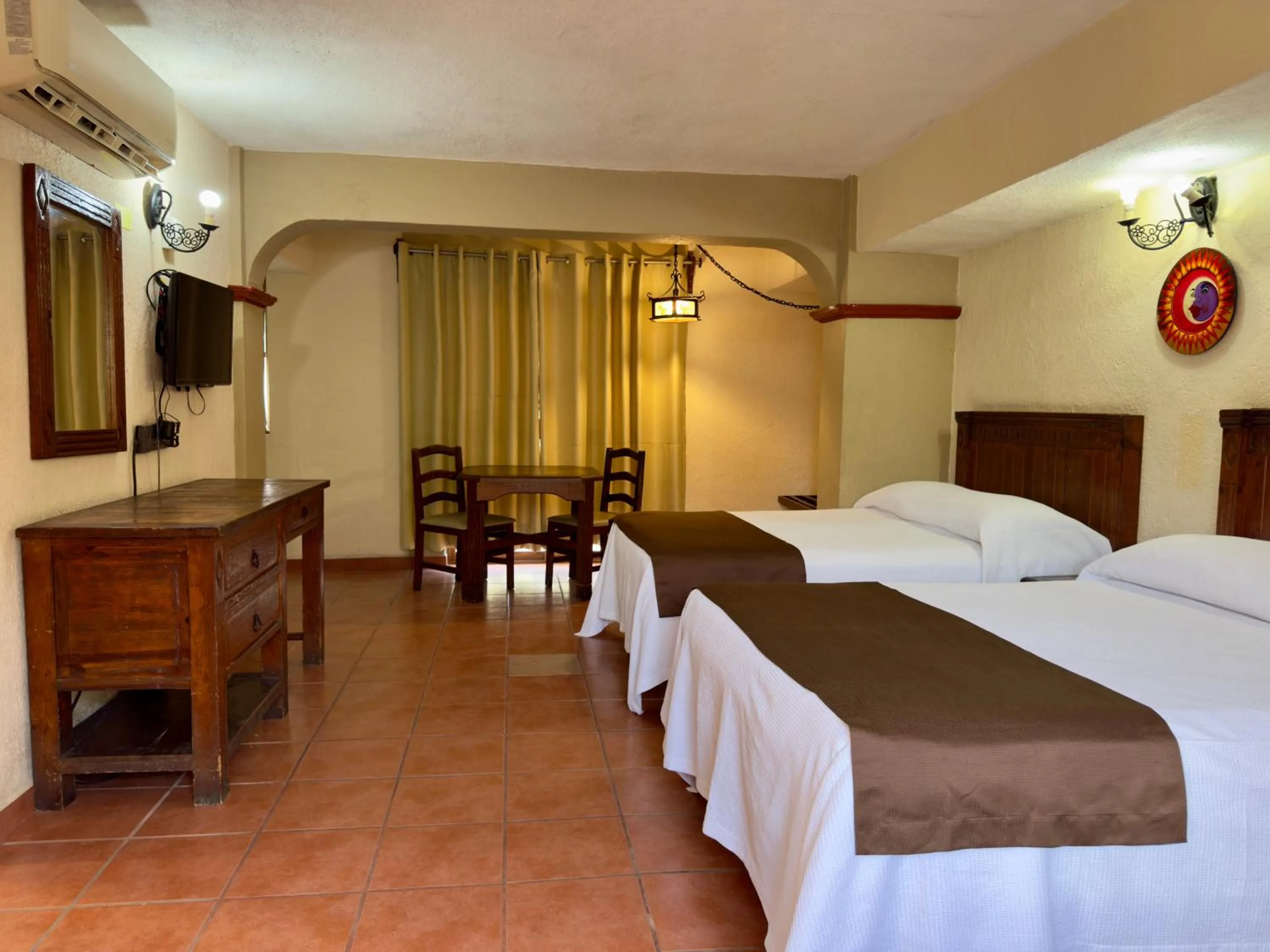 Bed in Hotel Hacienda María Eugenia Acapulco