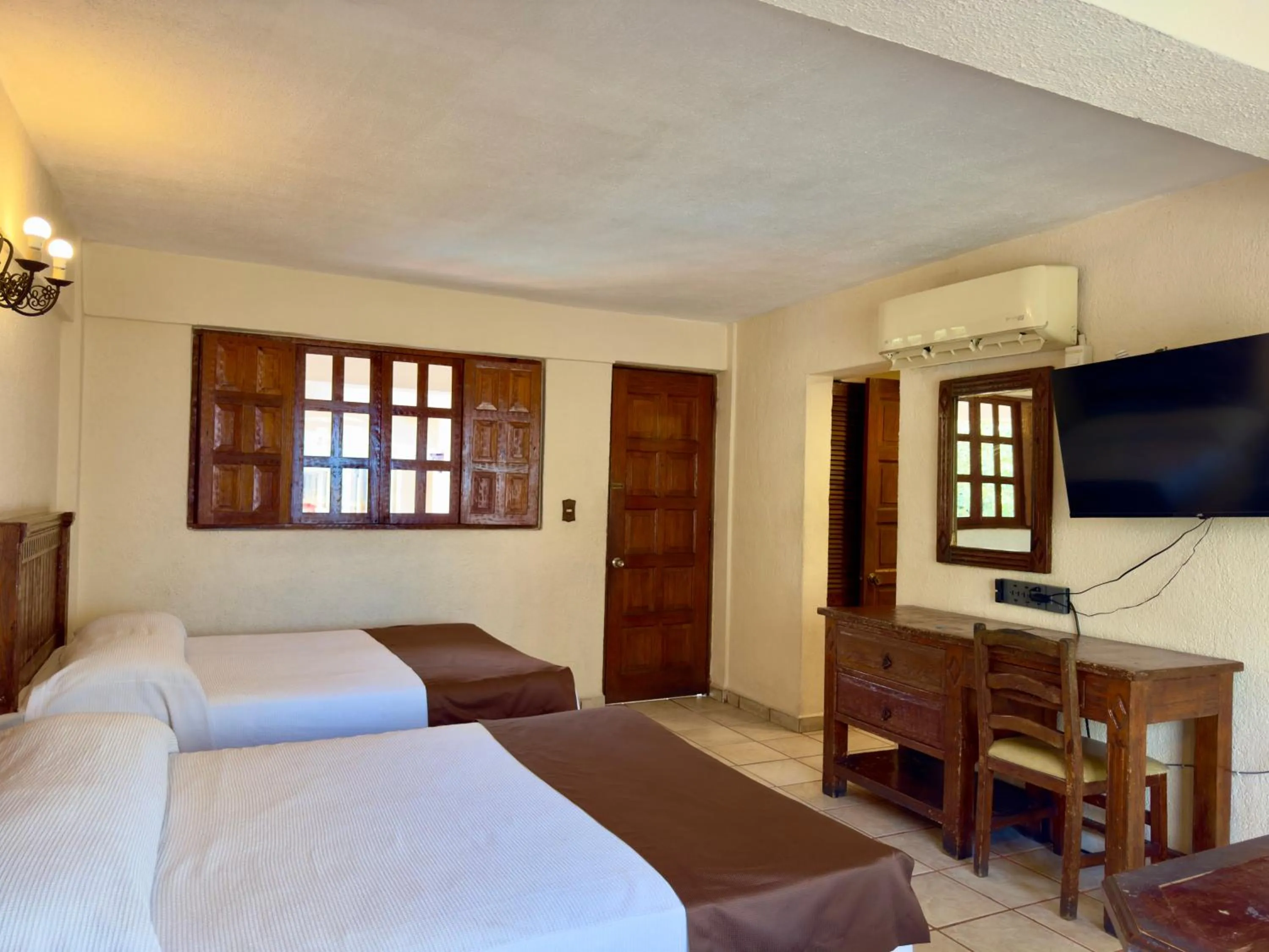 Bed in Hotel Hacienda María Eugenia Acapulco