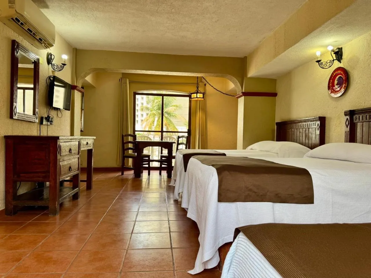 Bed in Hotel Hacienda María Eugenia Acapulco