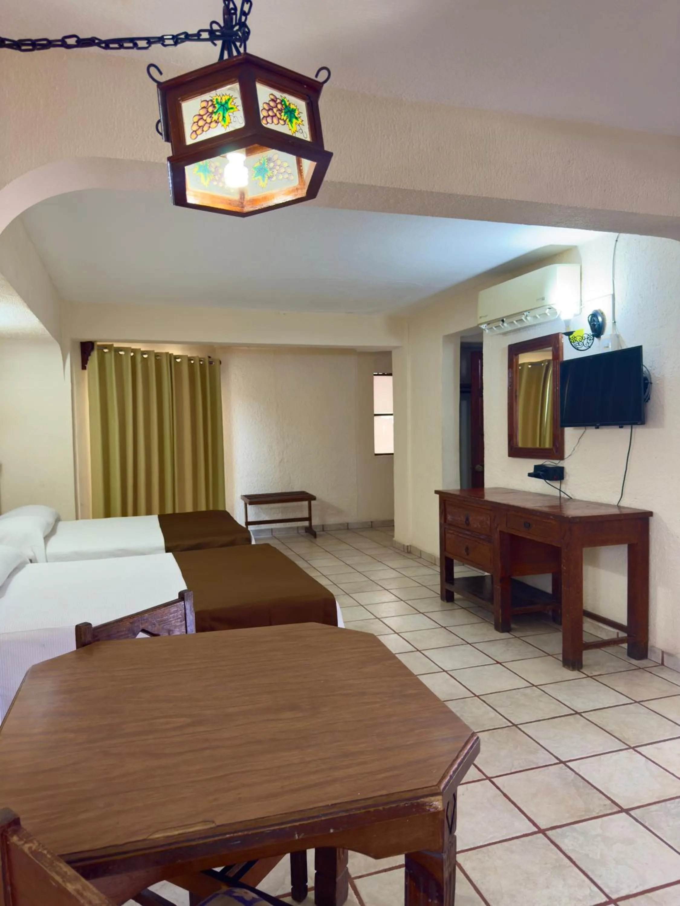 Bed in Hotel Hacienda María Eugenia Acapulco