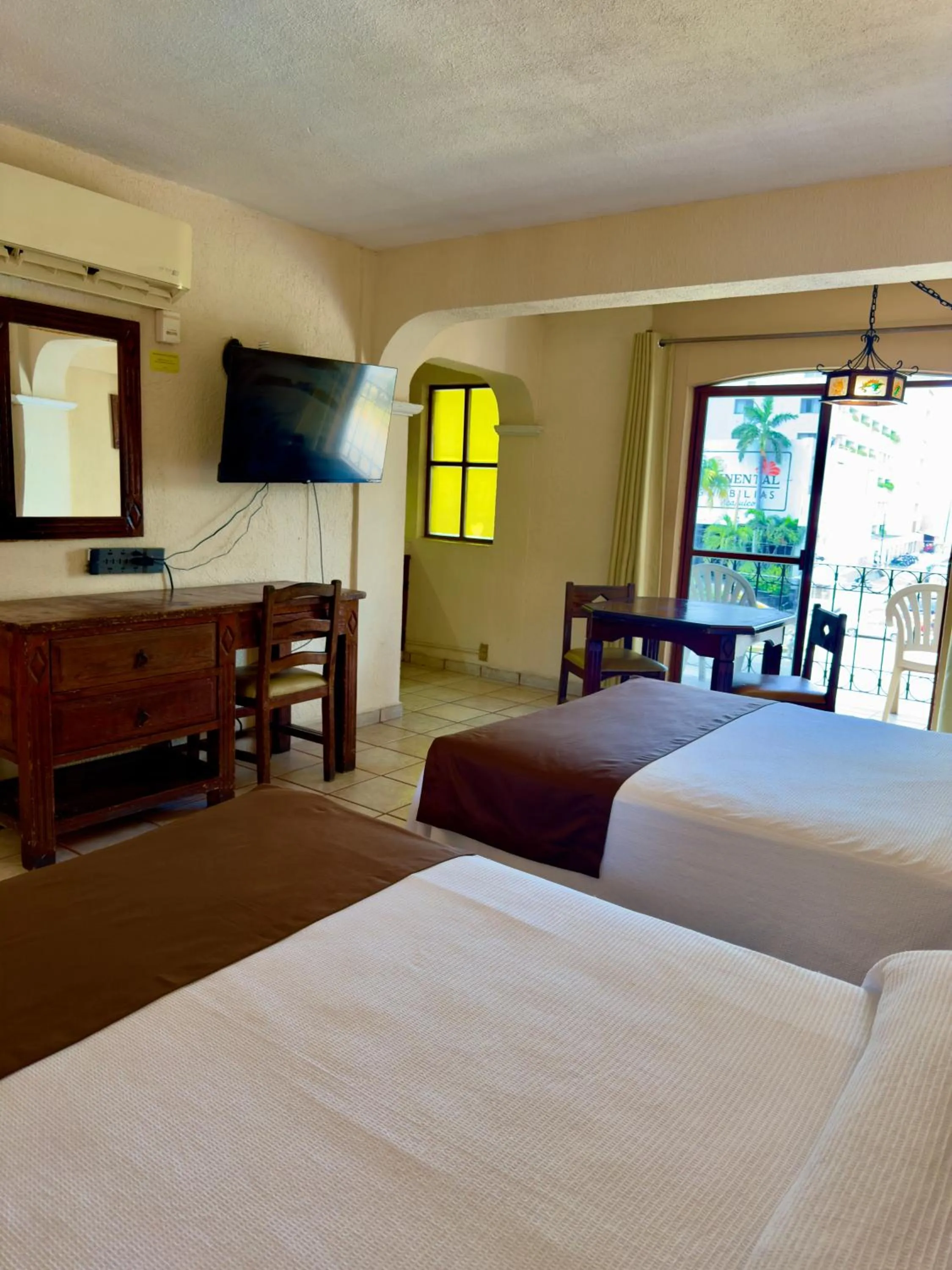 Bed in Hotel Hacienda María Eugenia Acapulco