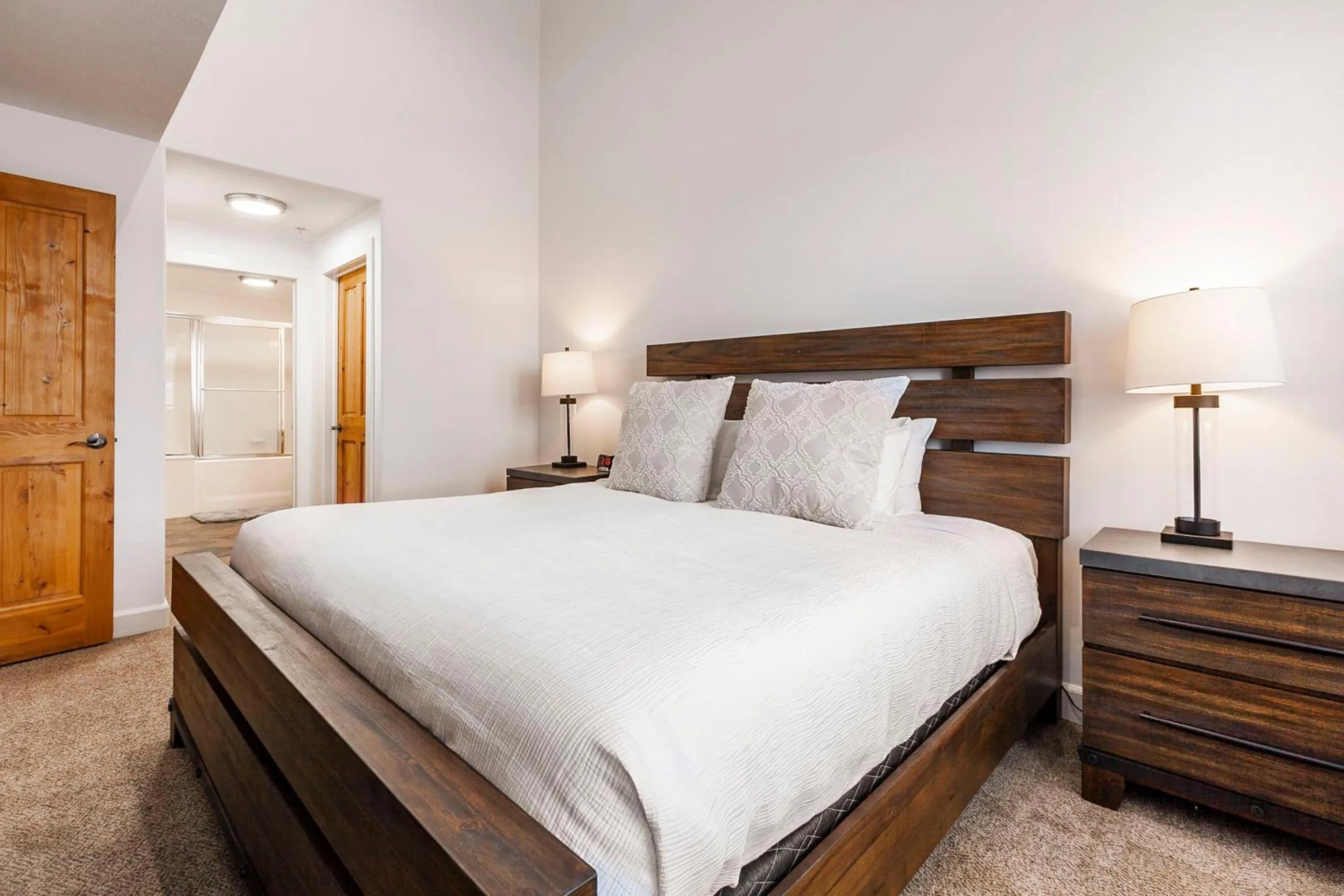 Bed in Crestview Condominiums by All Seasons Resort Lodging