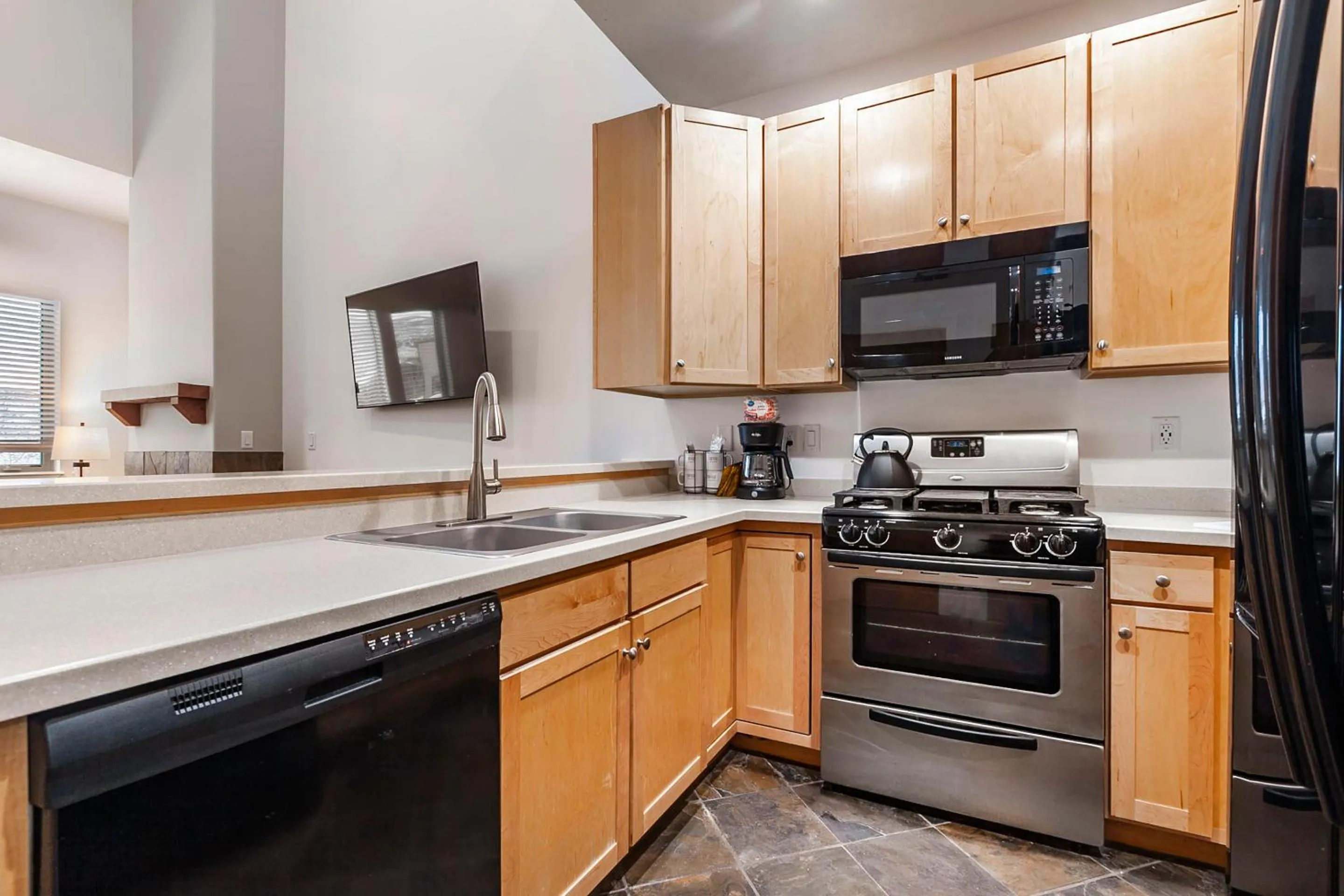 Kitchen or kitchenette in Crestview Condominiums by All Seasons Resort Lodging