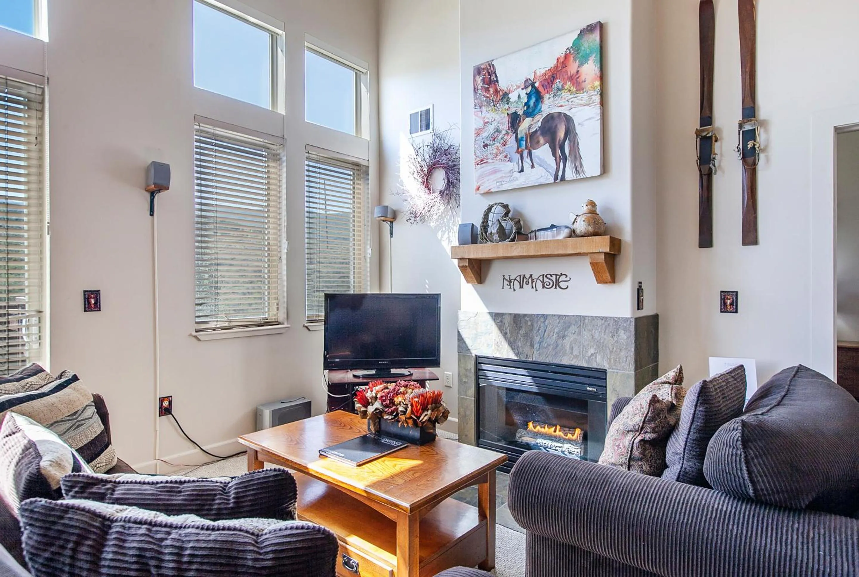 Living room in Crestview Condominiums by All Seasons Resort Lodging