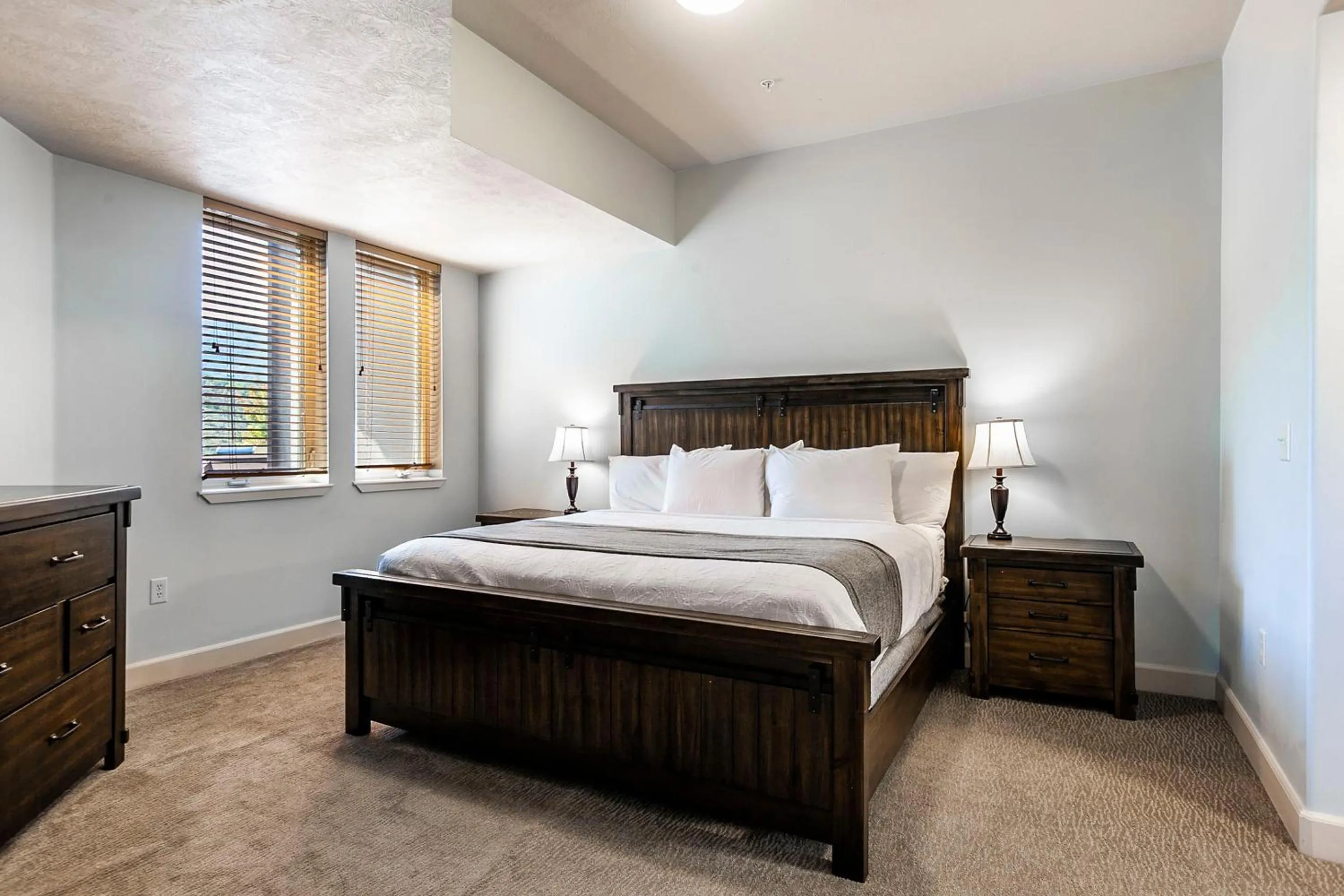 Bed in Crestview Condominiums by All Seasons Resort Lodging