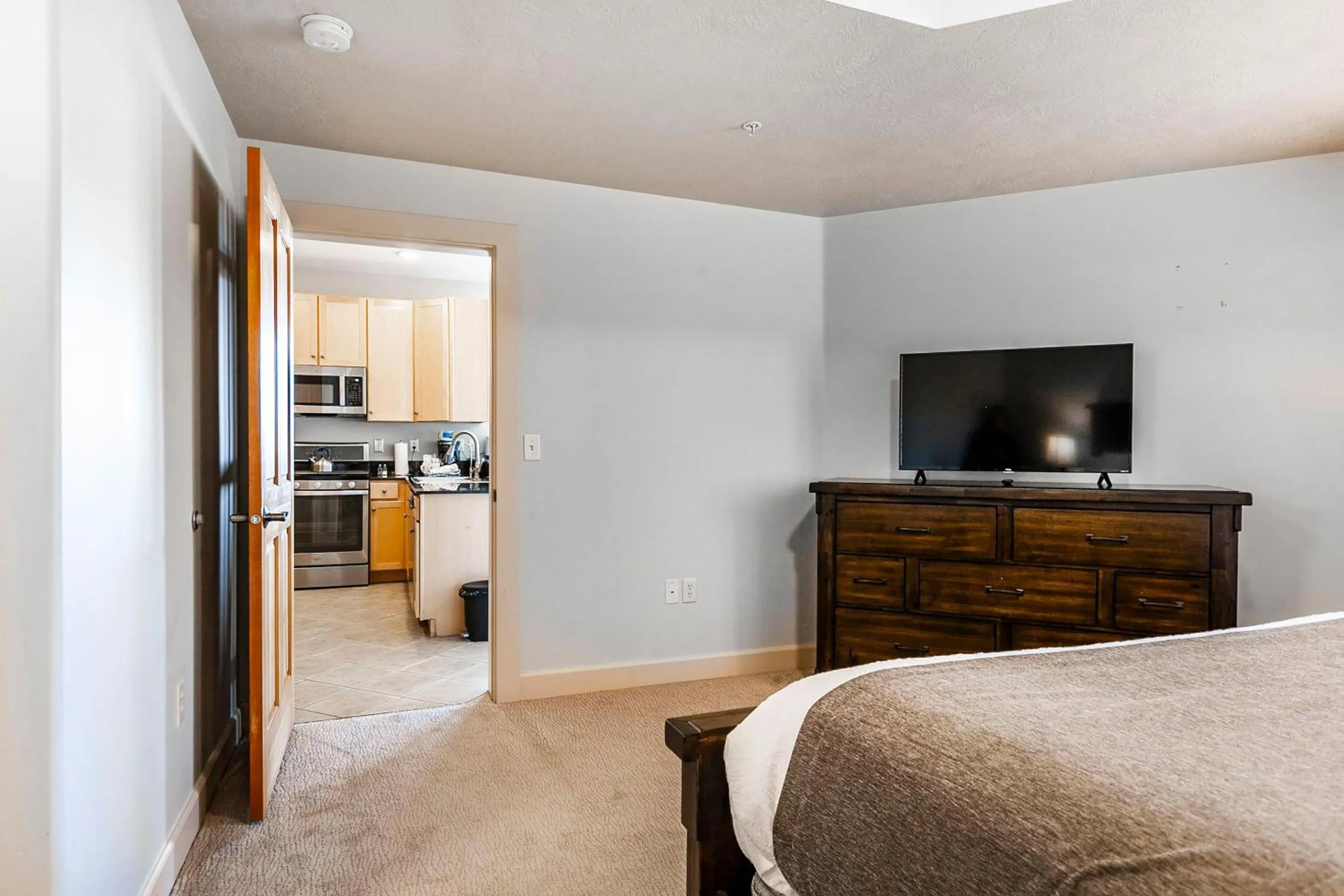 Bed in Crestview Condominiums by All Seasons Resort Lodging