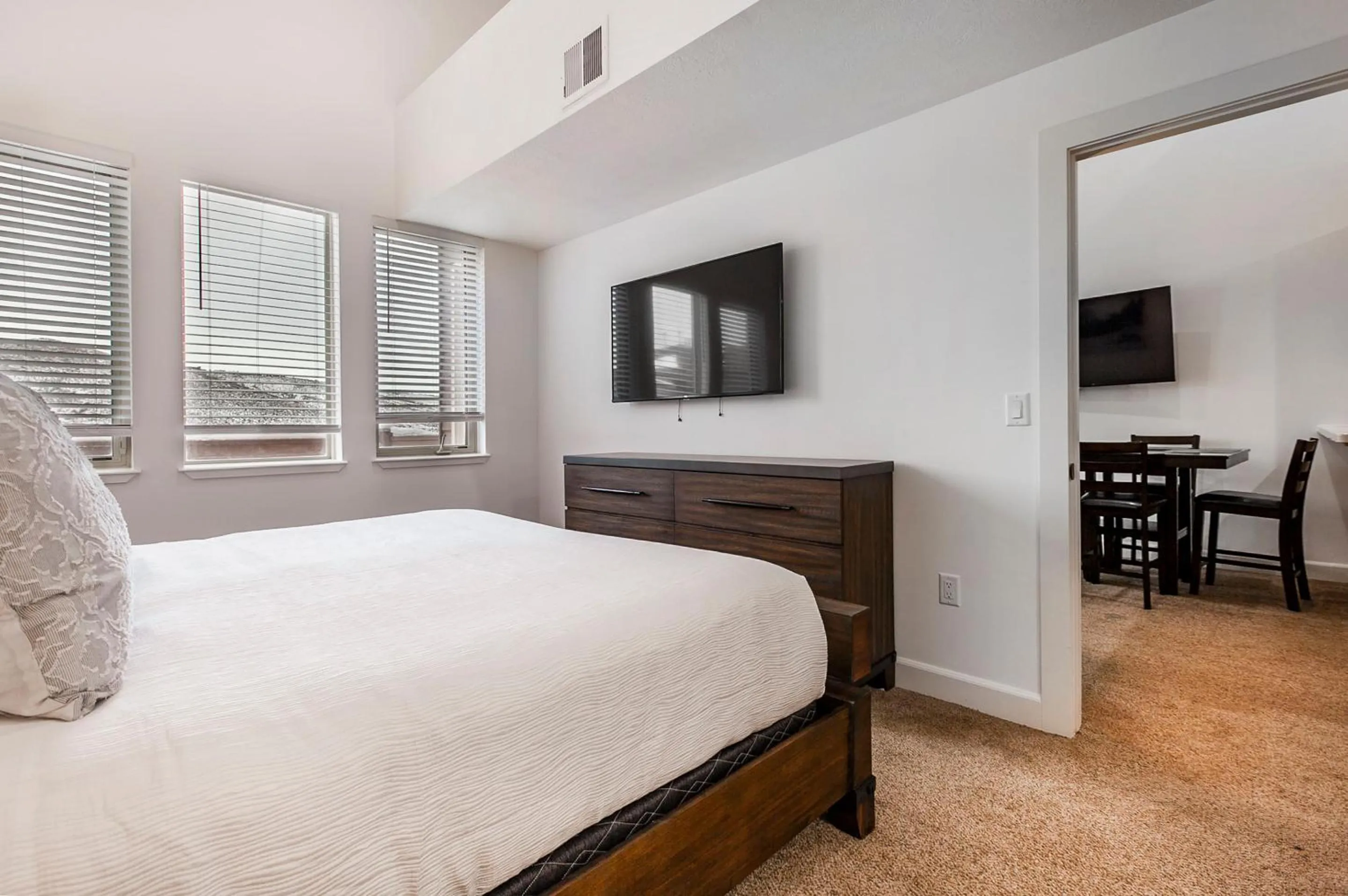 Bed in Crestview Condominiums by All Seasons Resort Lodging