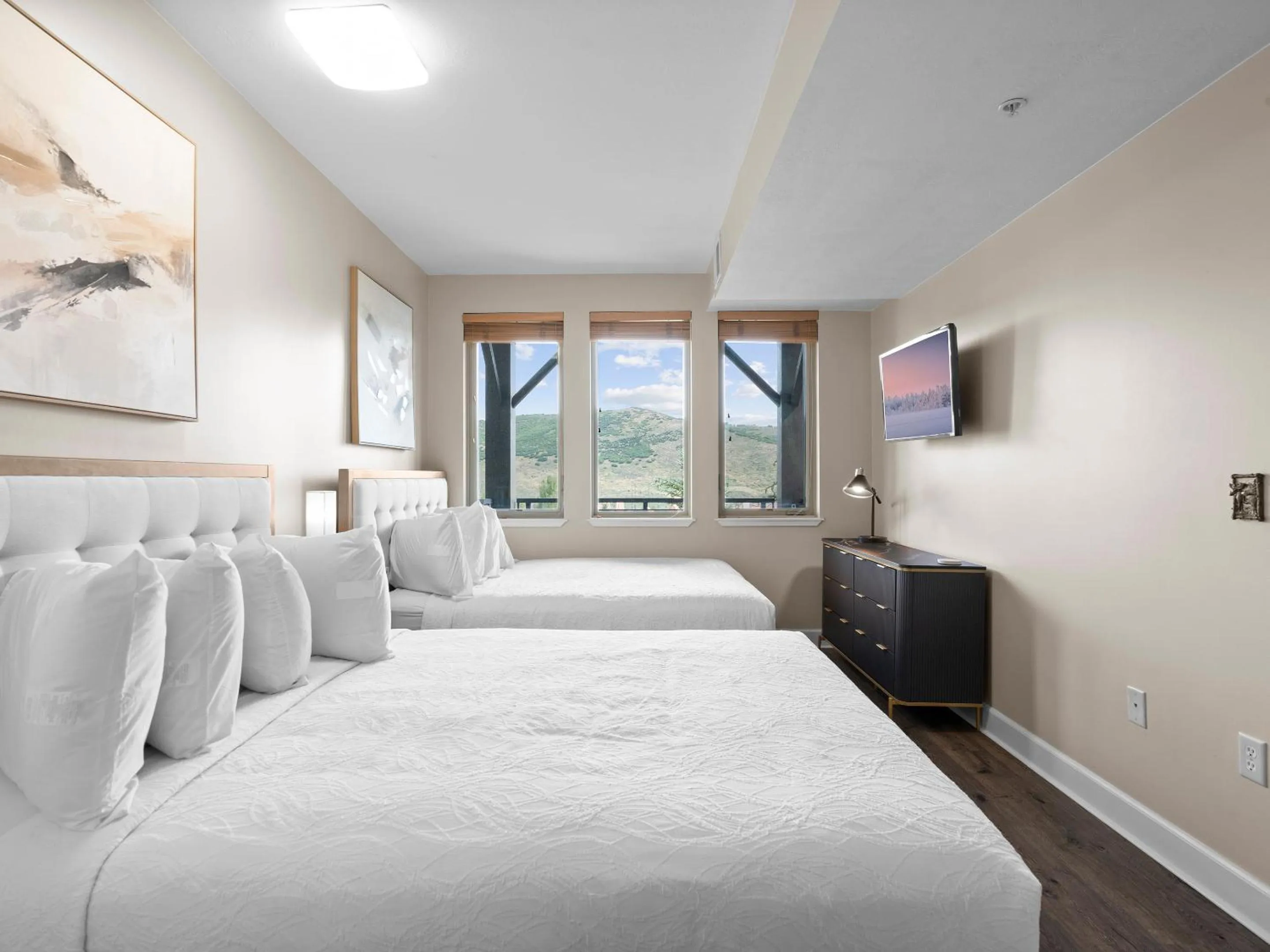 Bed in Crestview Condominiums by All Seasons Resort Lodging