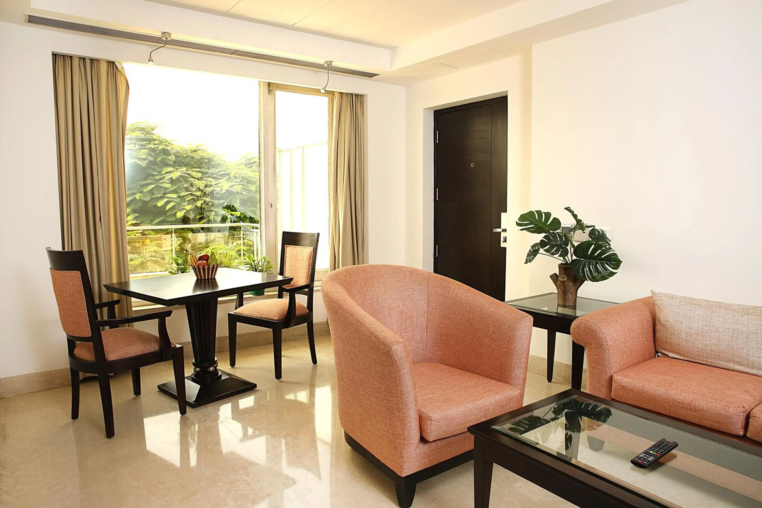 Living room in Inde Hotel Huda City Centre Vista Woods, Gurgaon