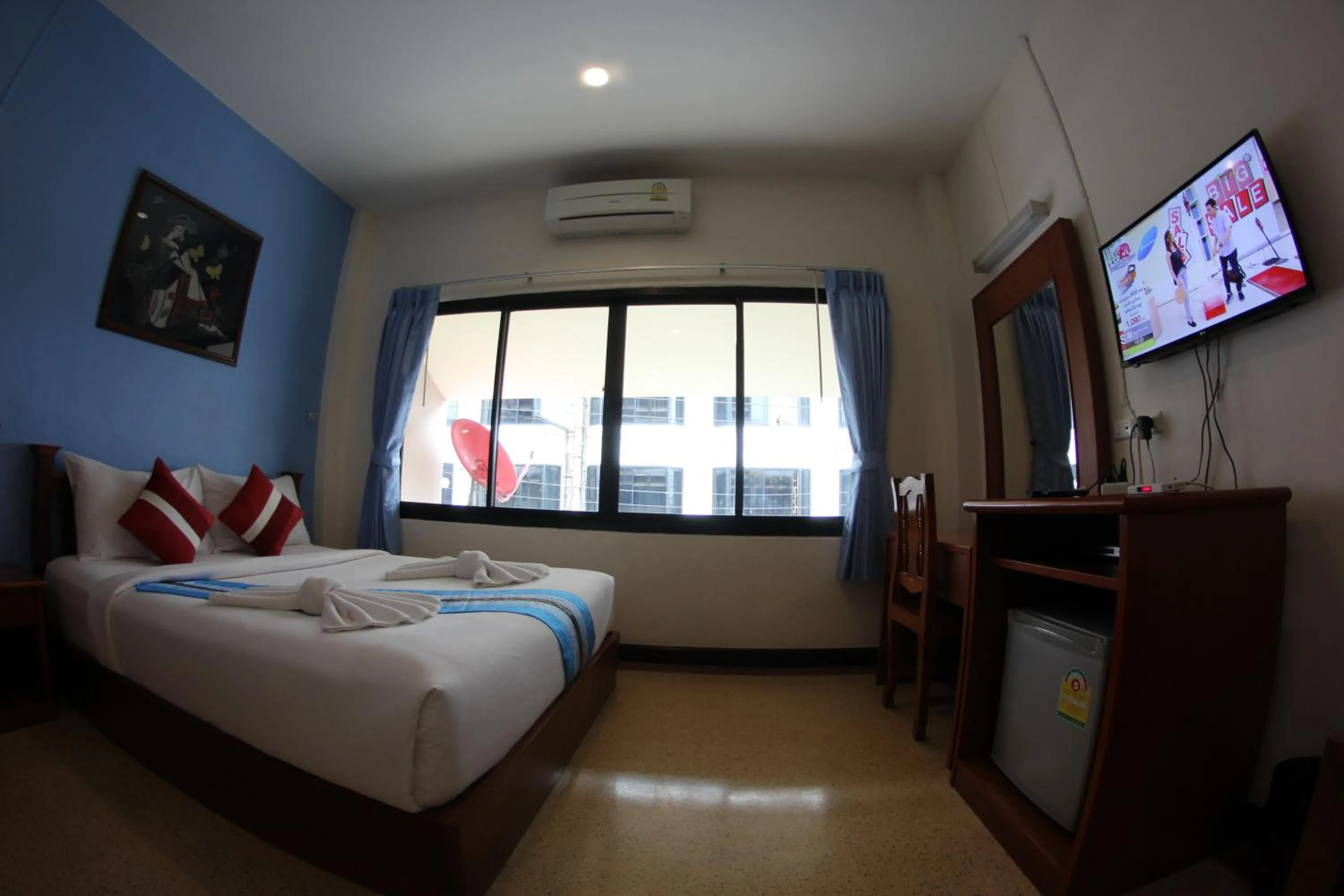 Communal lounge/ TV room, Bed in Myplace@Surat Hotel