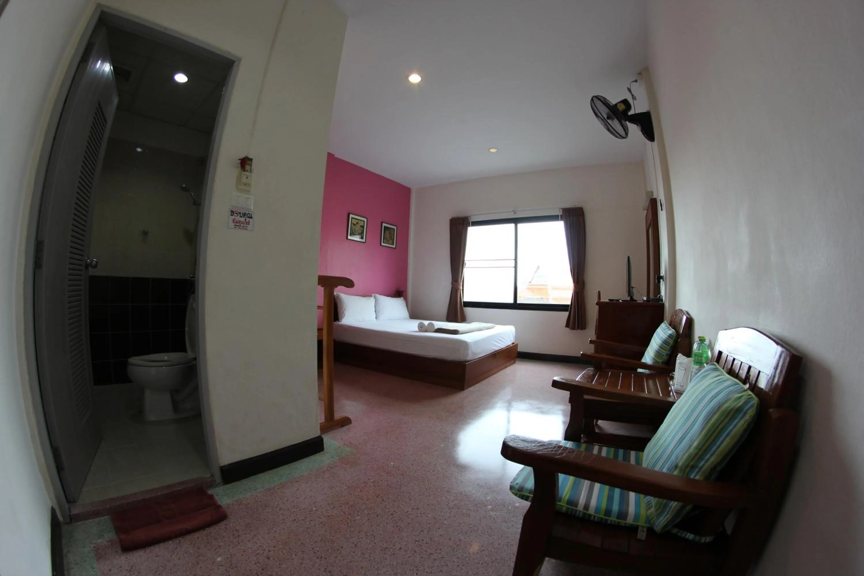 Living room, Bed in Myplace@Surat Hotel