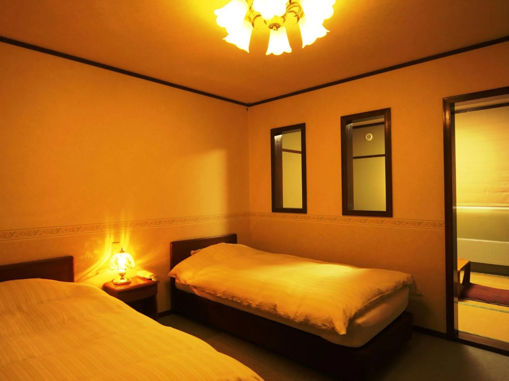 Photo of the whole room, Bed in Pension Raisin