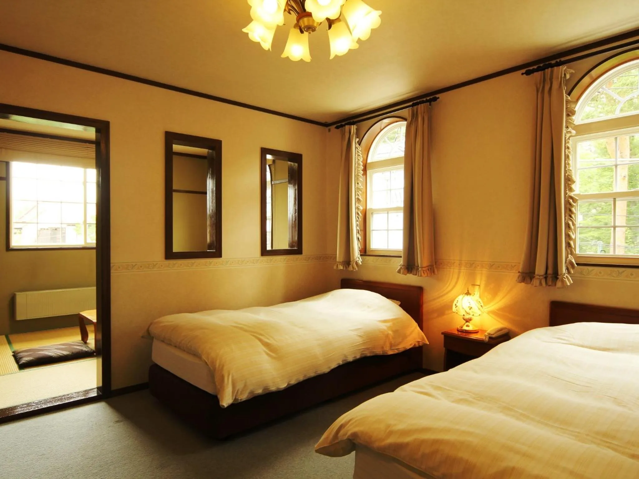 Photo of the whole room, Bed in Pension Raisin