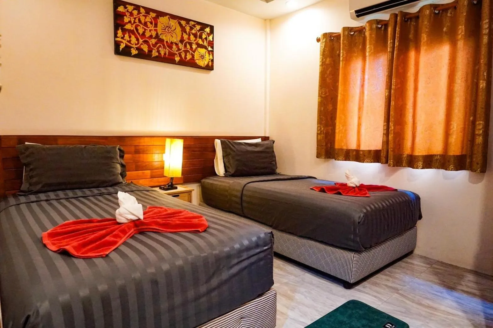 Bed in Pinthong Aonang Villa