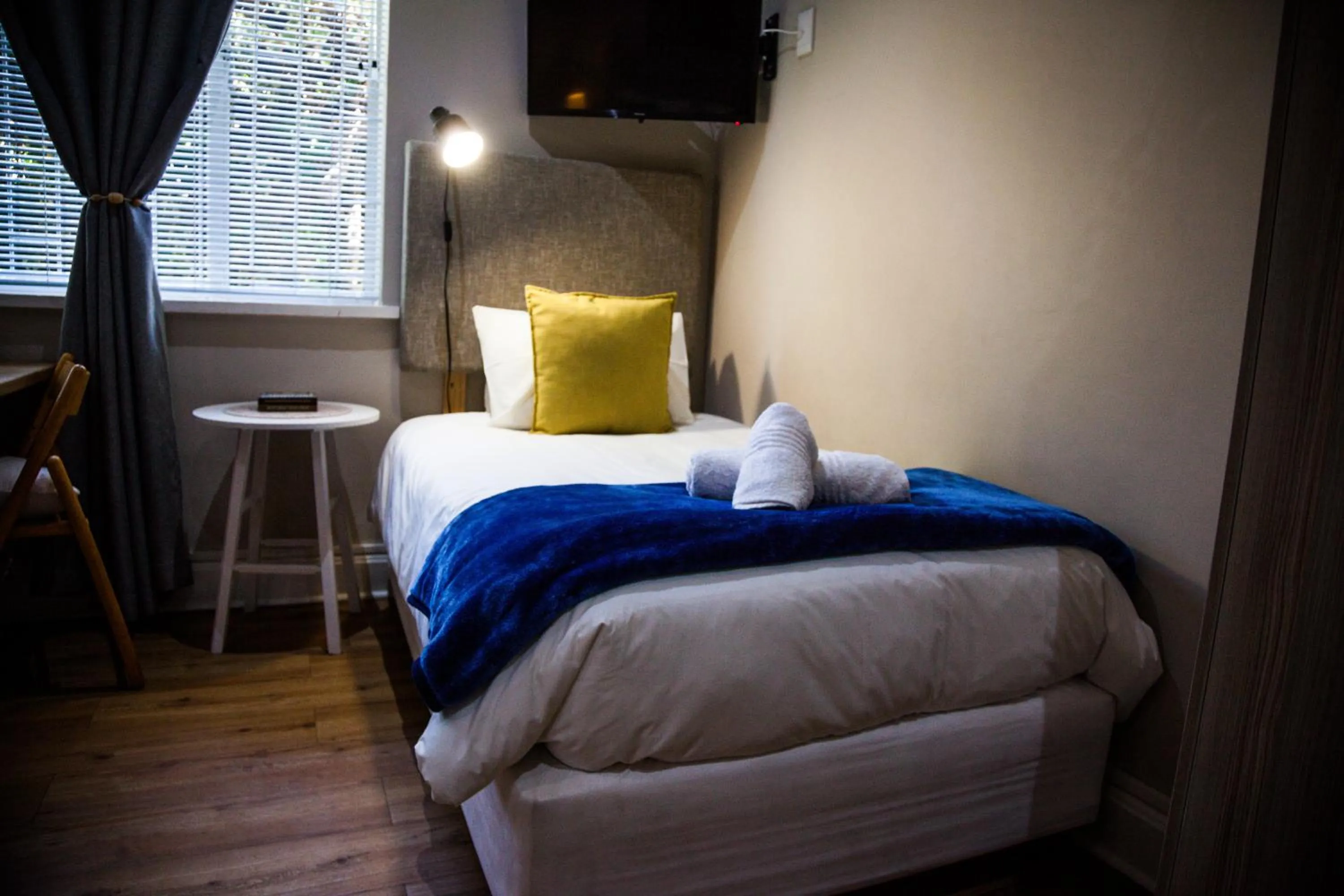 Bed in De Akker Guest House Oudtshoorn