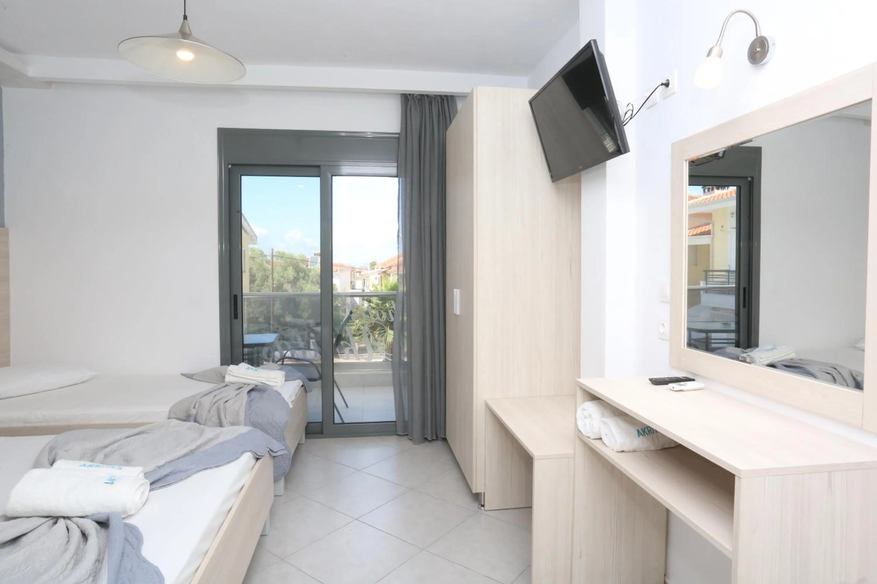 TV and multimedia, Bed in Akritas Hotel Pefkochori