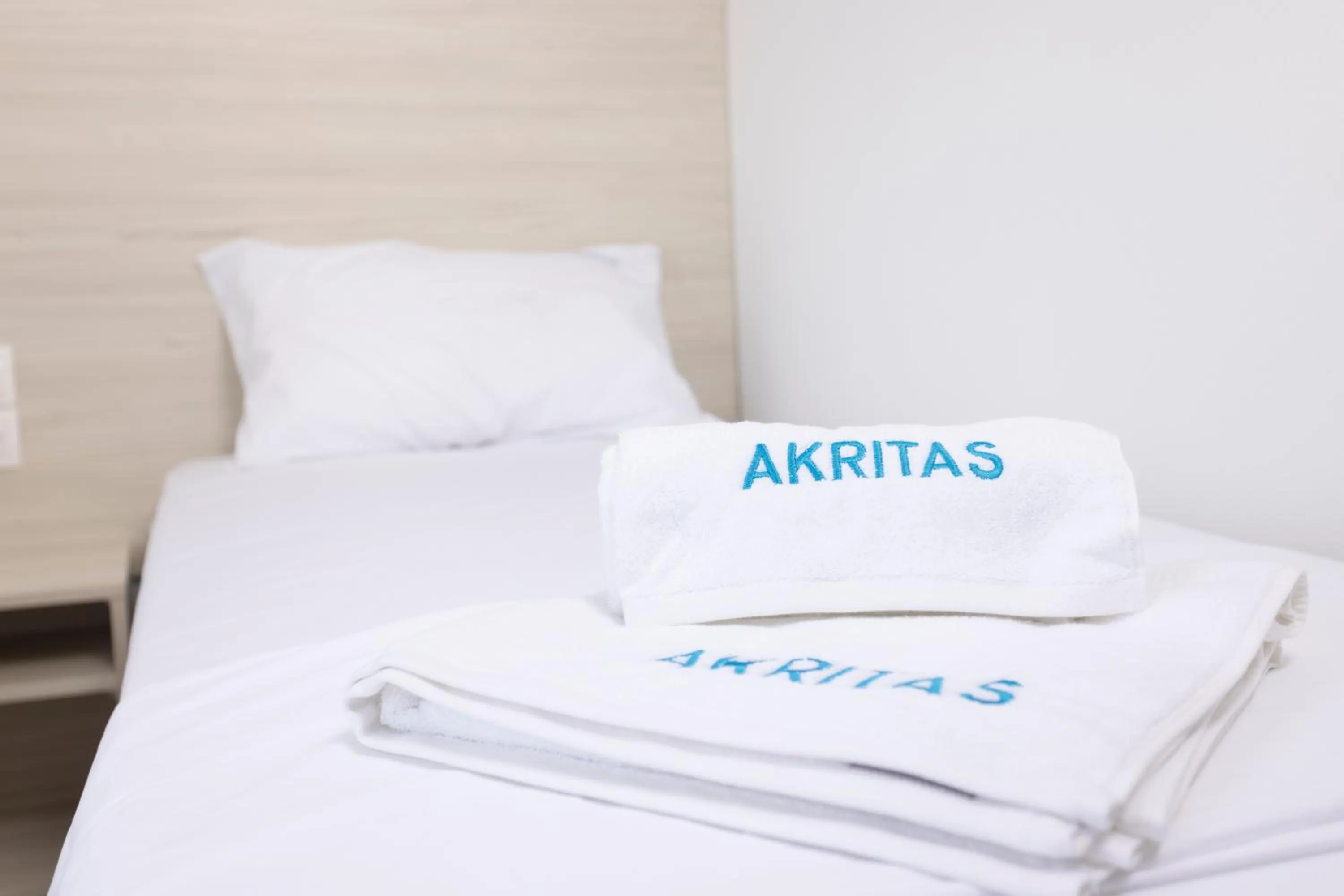 towels, Bed in Akritas Hotel Pefkochori
