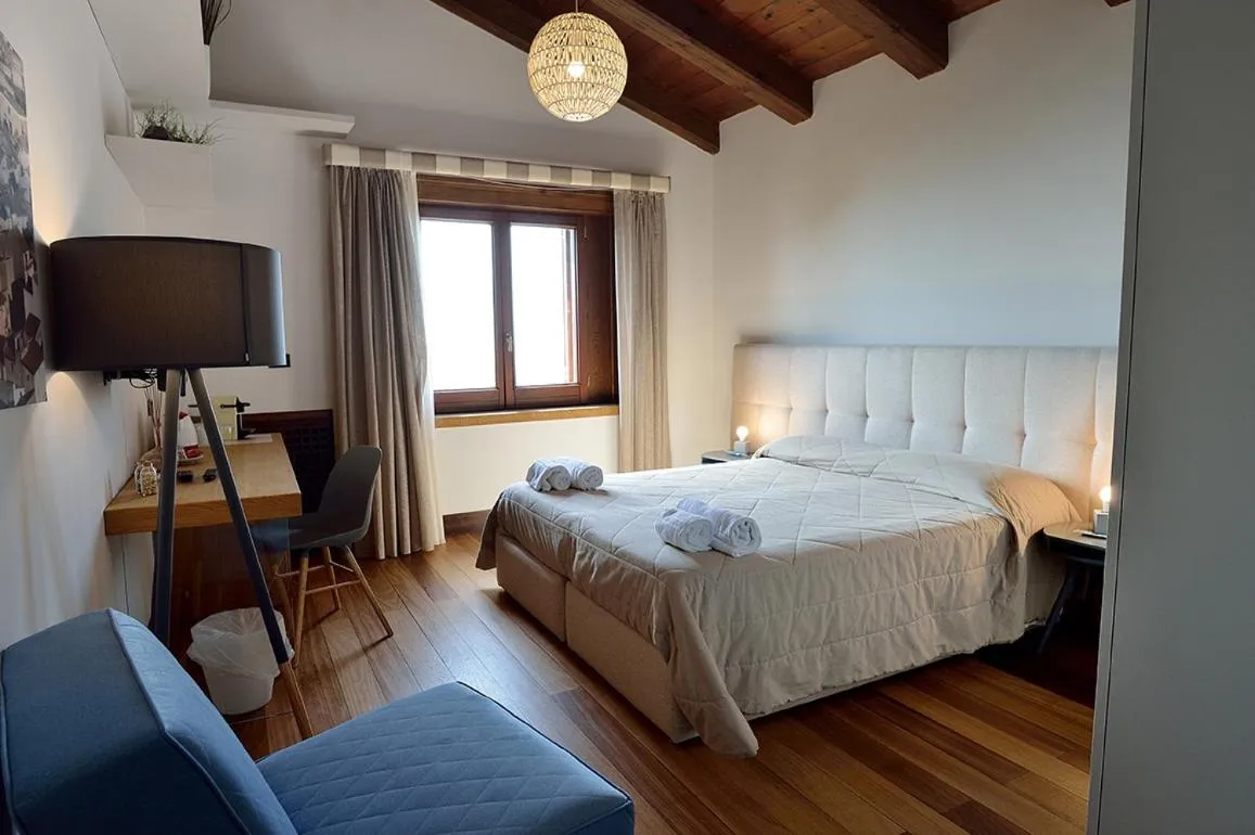 Photo of the whole room, Bed in Casa Realia