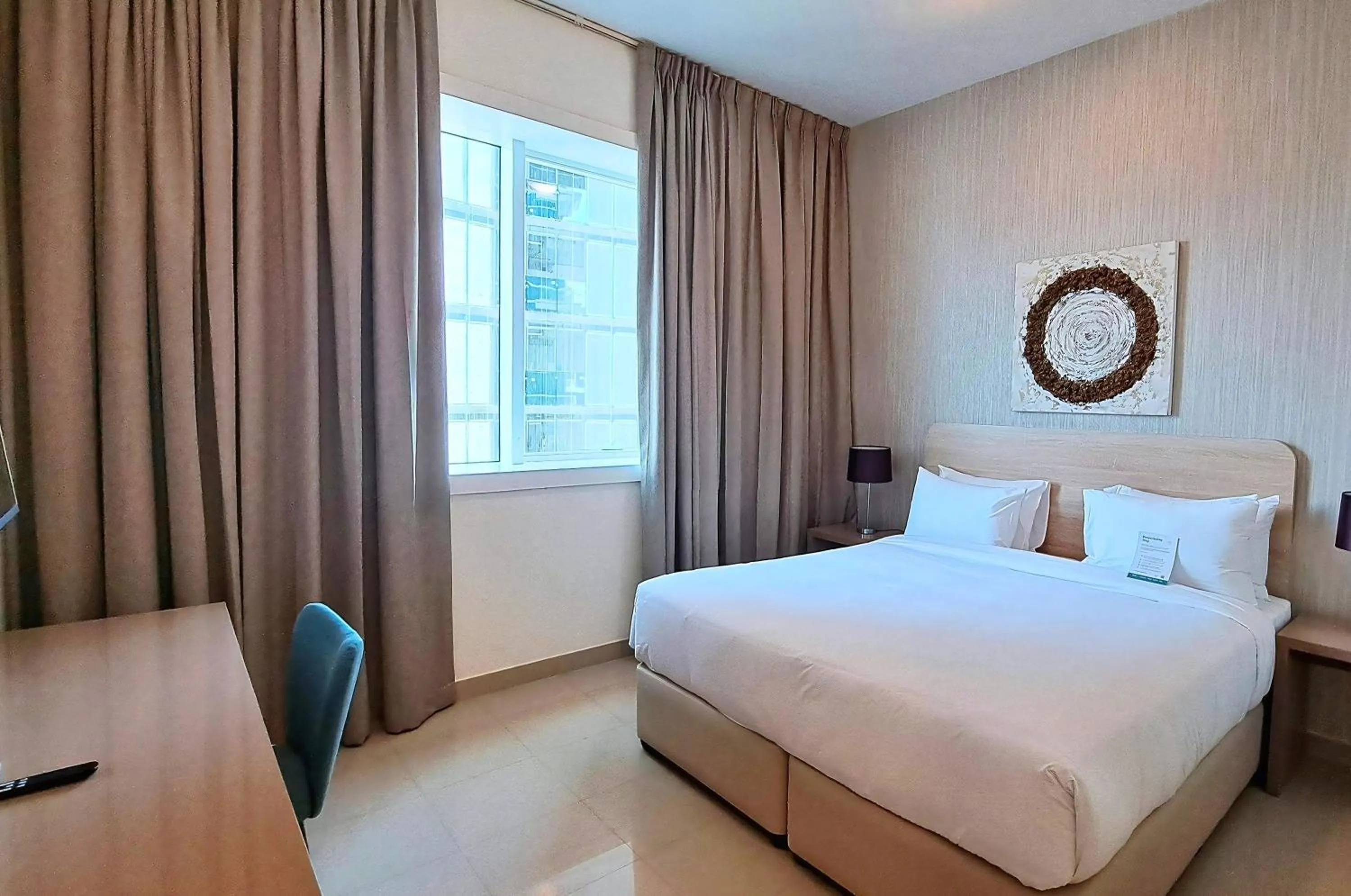 Bed in Barceló Residences Dubai Marina