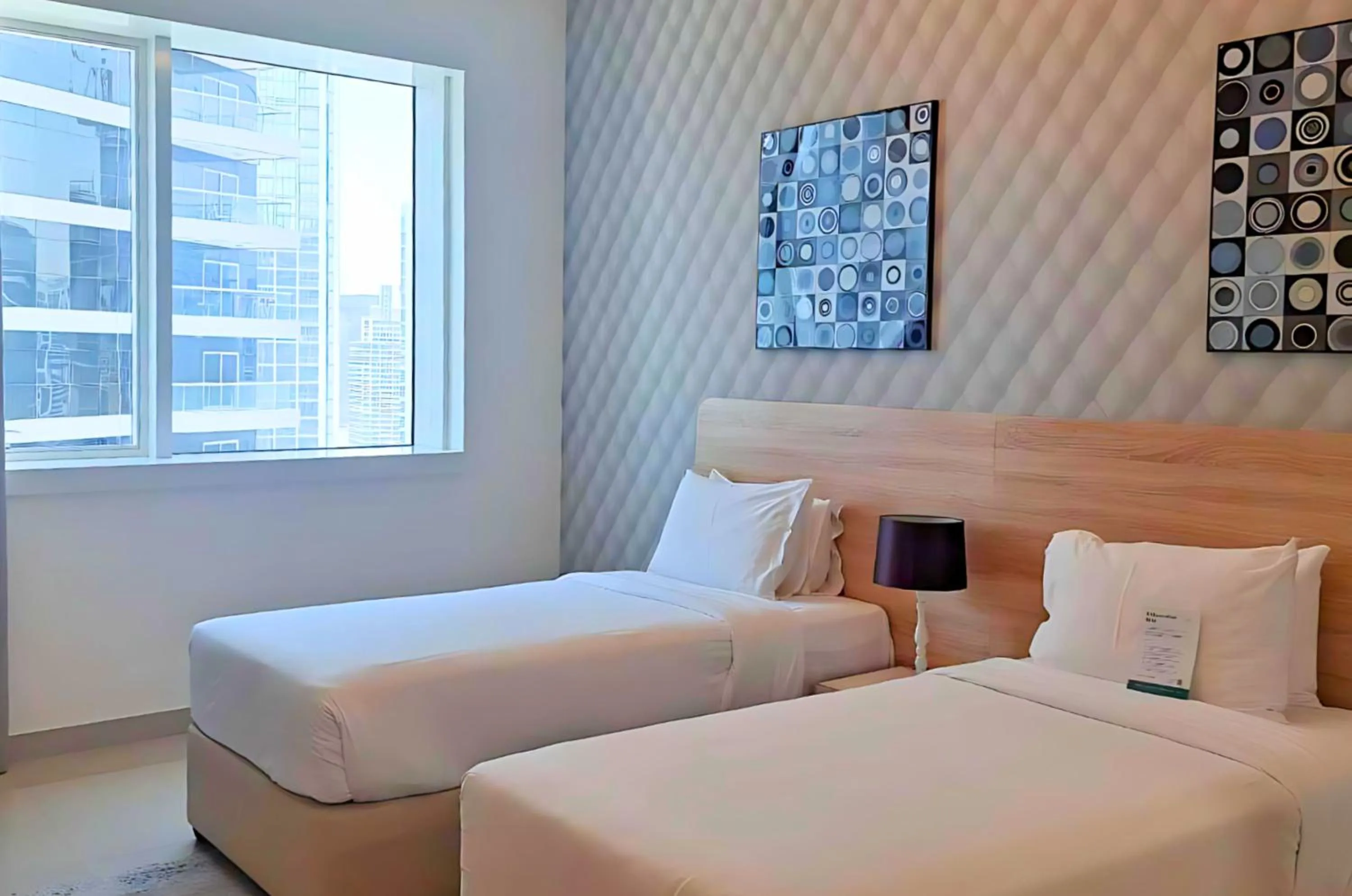 Bed in Barceló Residences Dubai Marina