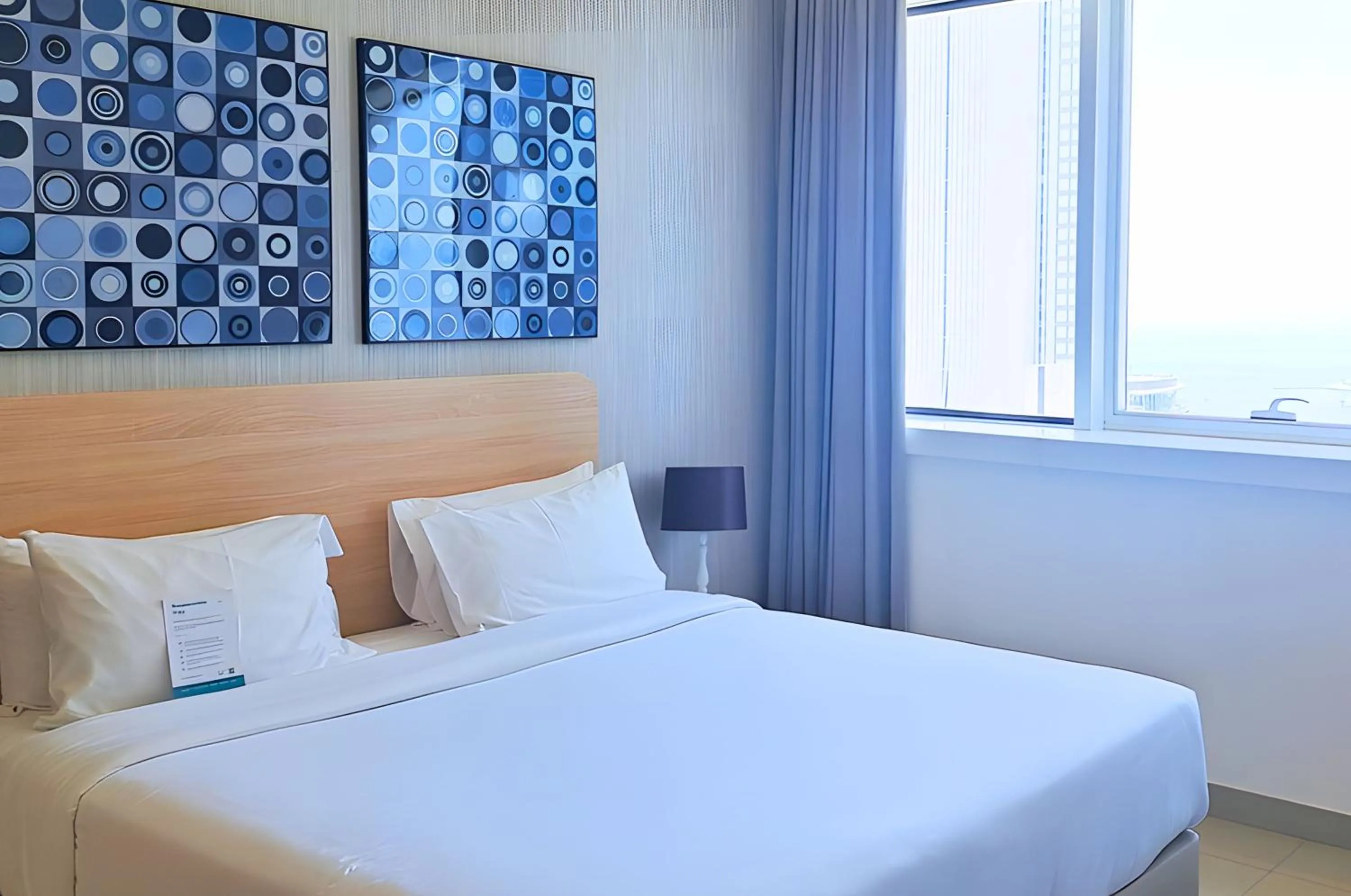 Bed in Barceló Residences Dubai Marina