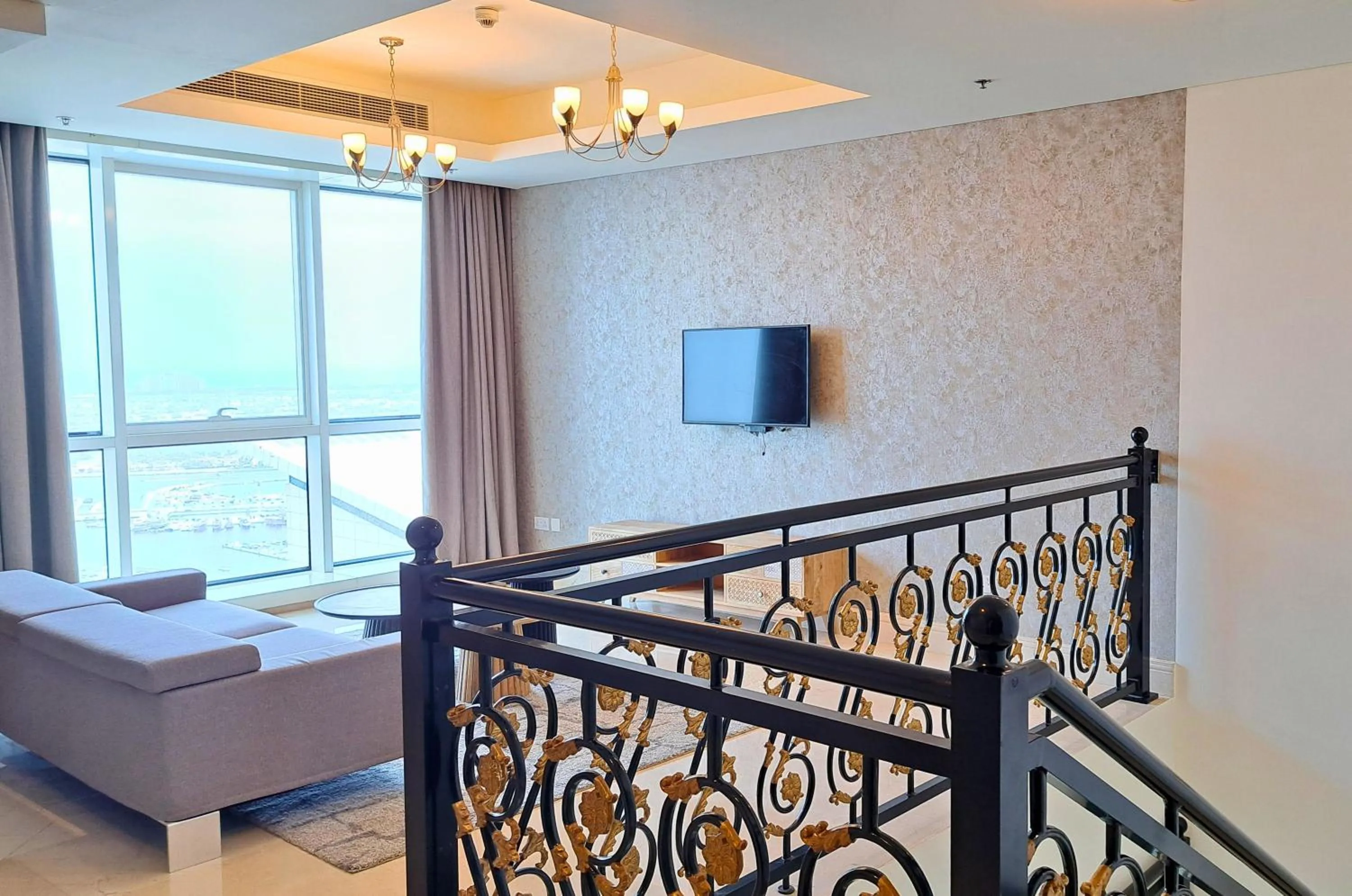 Living room, Bed in Barceló Residences Dubai Marina