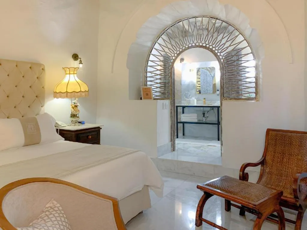 Bedroom in Hotel Boutique El Marqués By GEH Suites