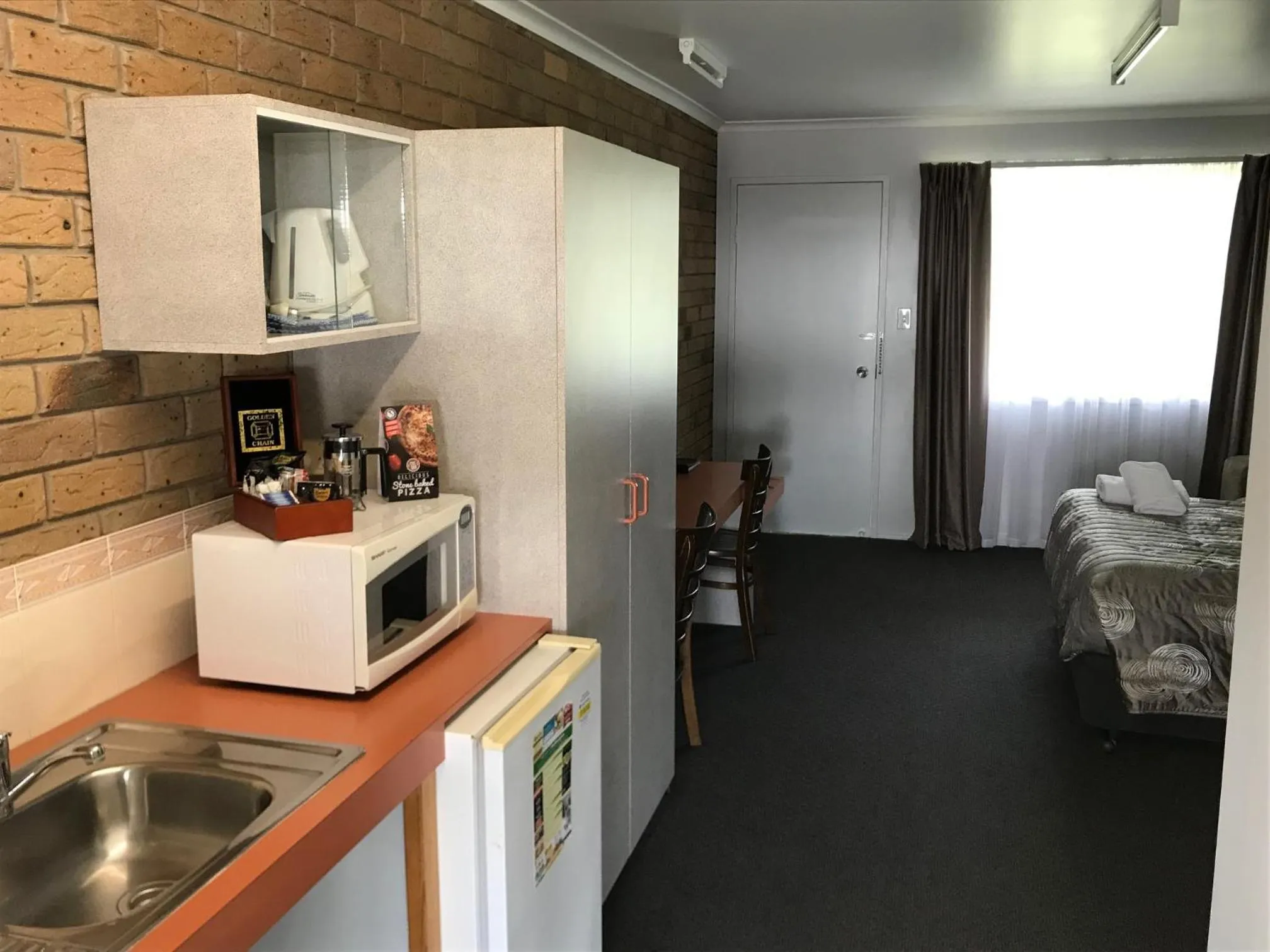 Bed in True Blue Motor Inn