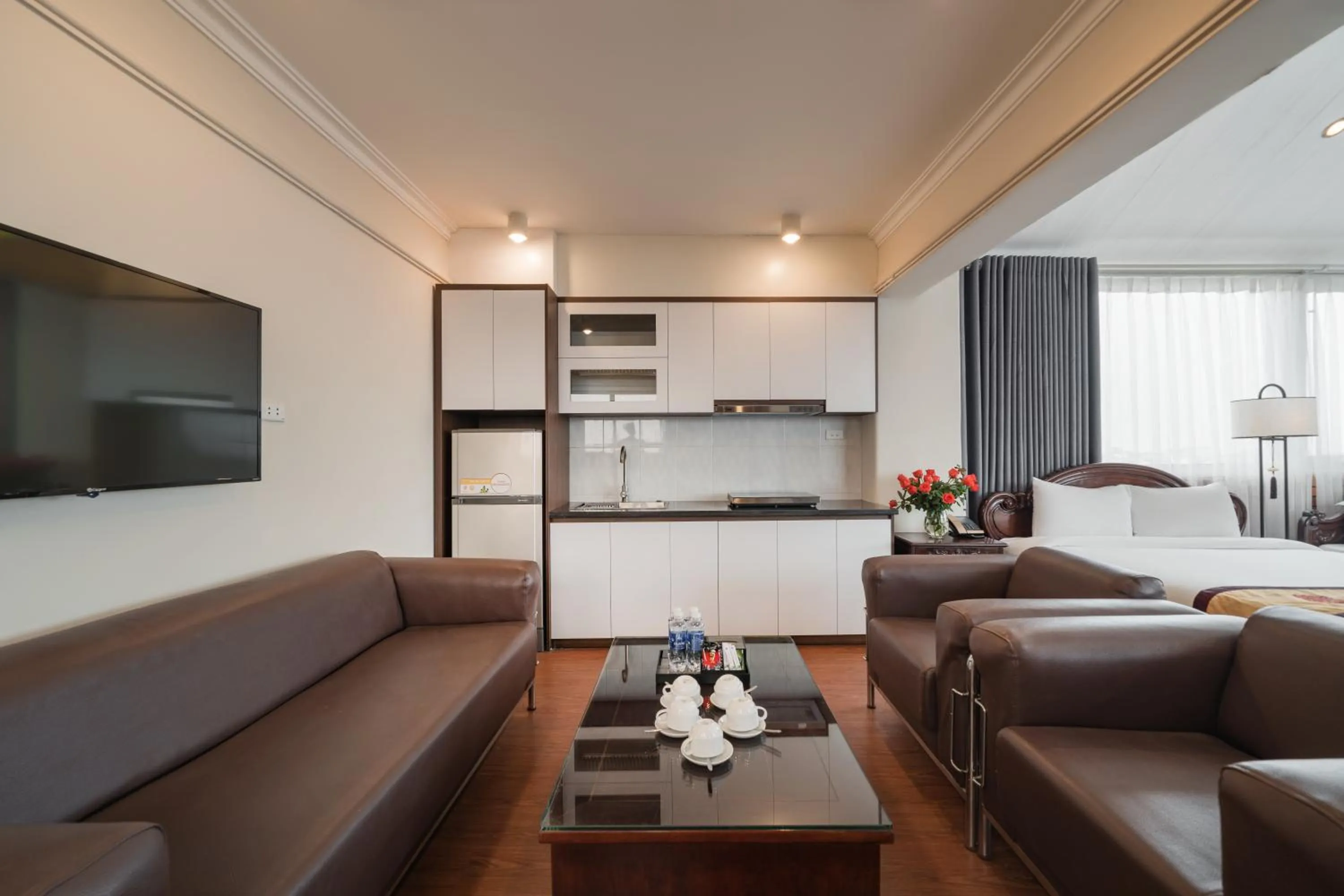 Communal lounge/ TV room in Hanoi Little Town Hotel