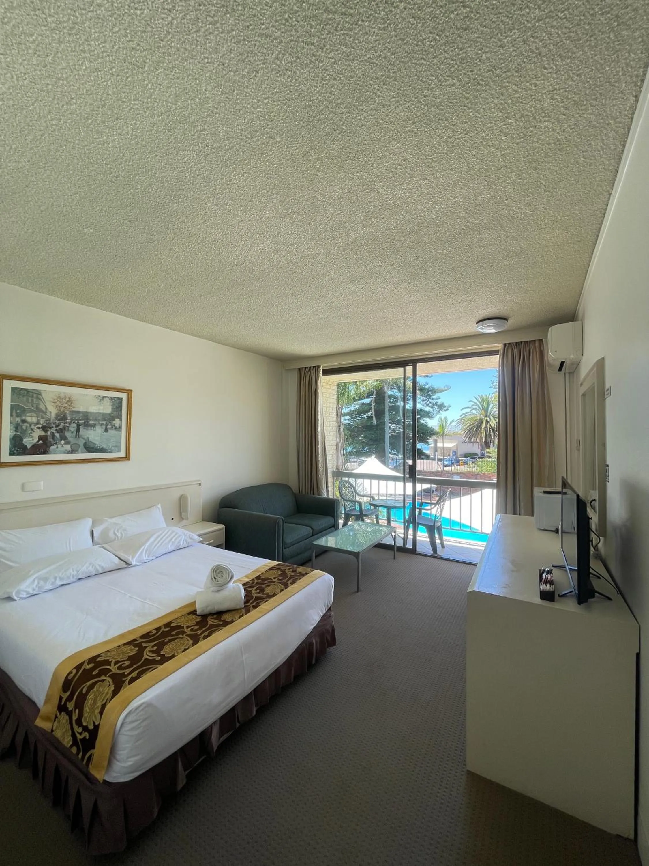 Bed in El Lago Waters Hotel