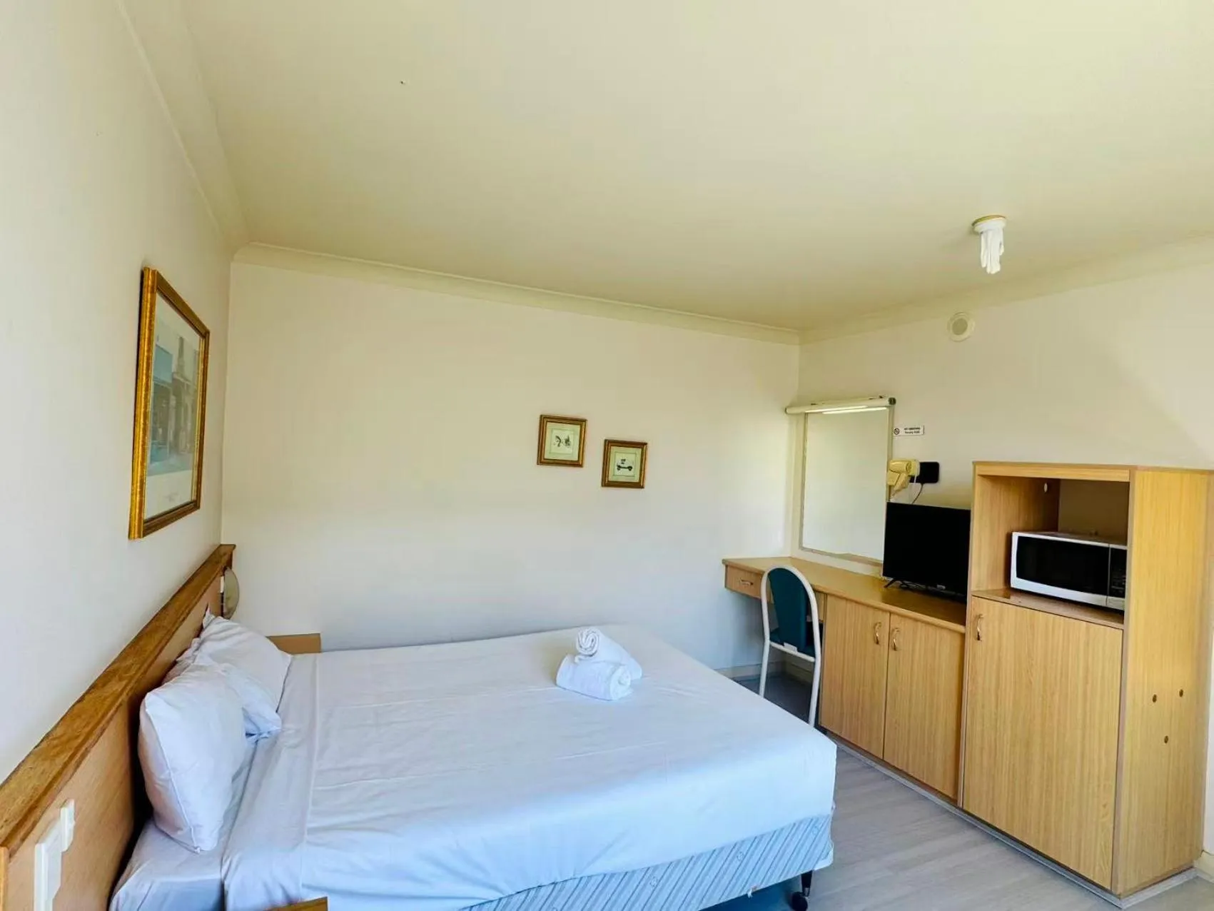 Bed in El Lago Waters Hotel